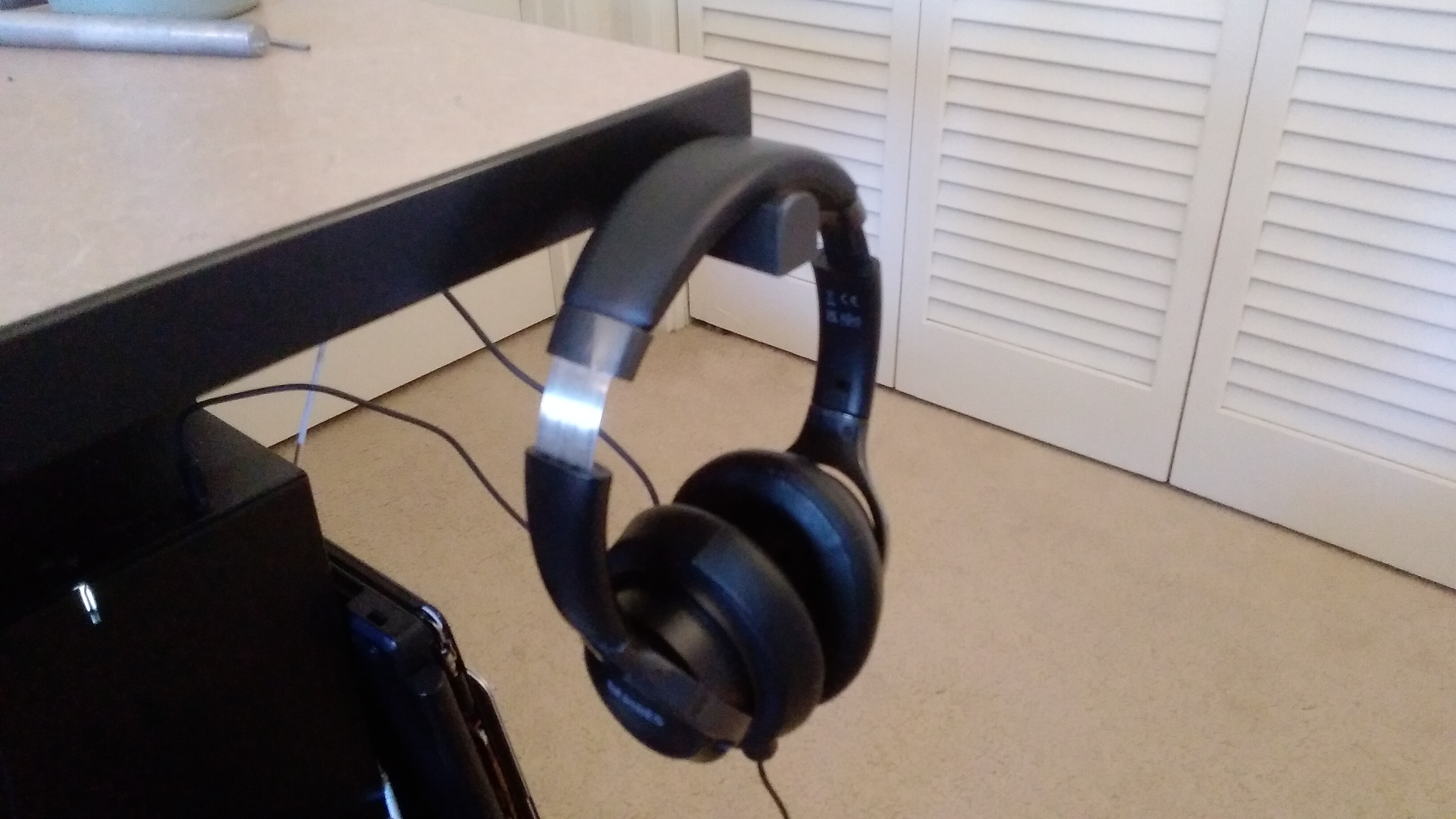 Screw in headphone hook