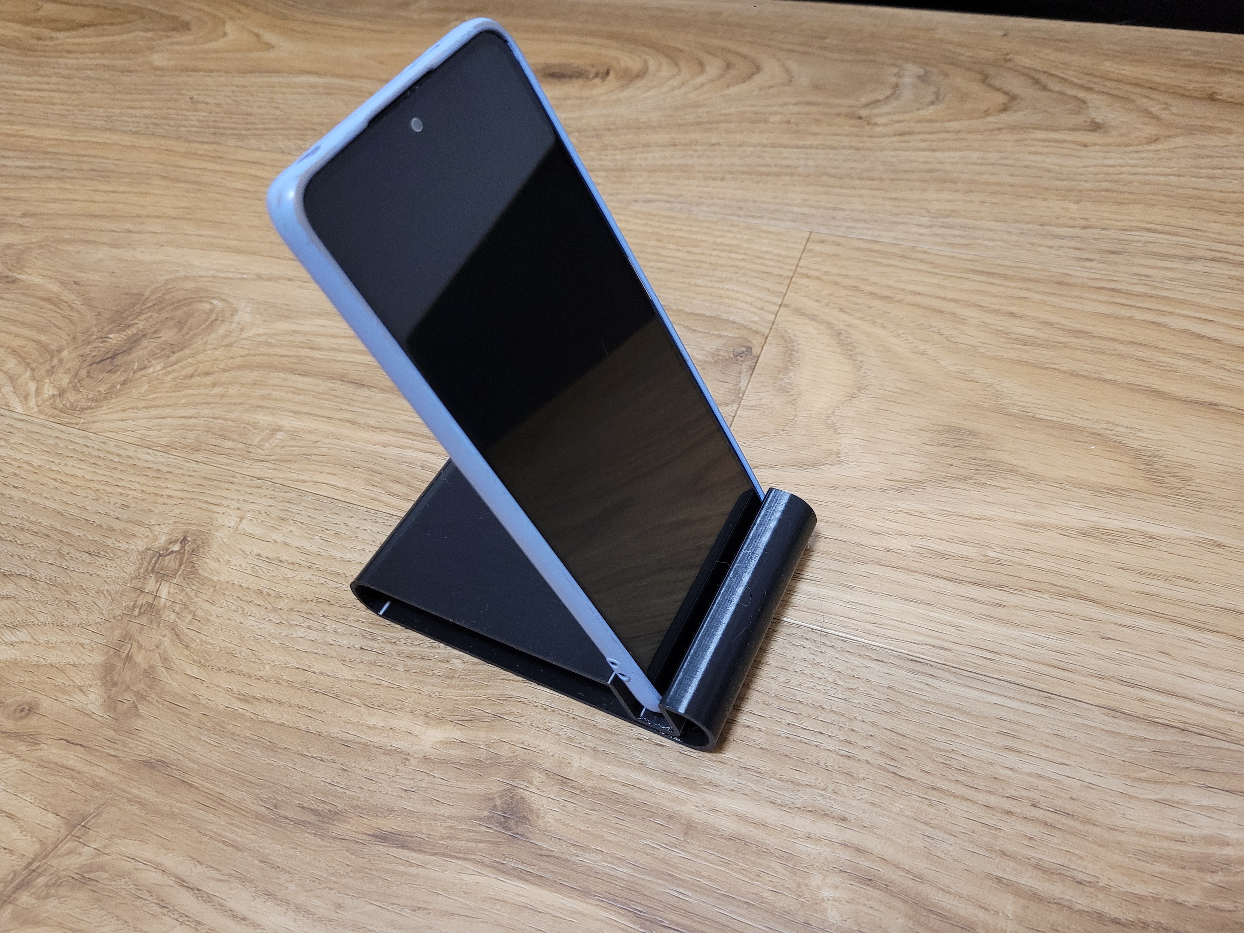 Minimalistic phone holder/stand
