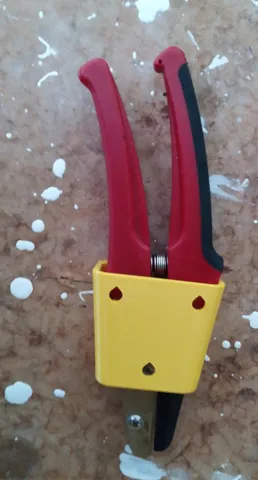 Garden secateur wall holder