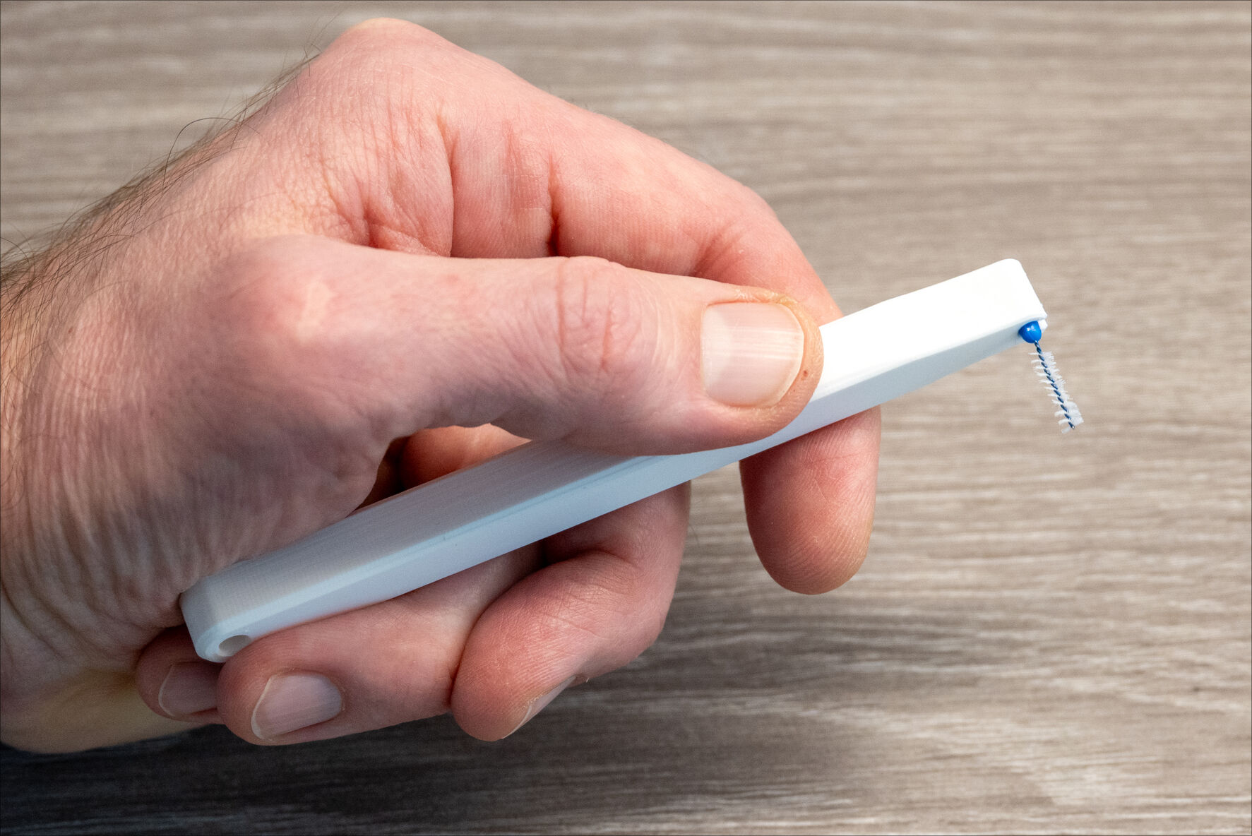 Interdental toothbrush holder