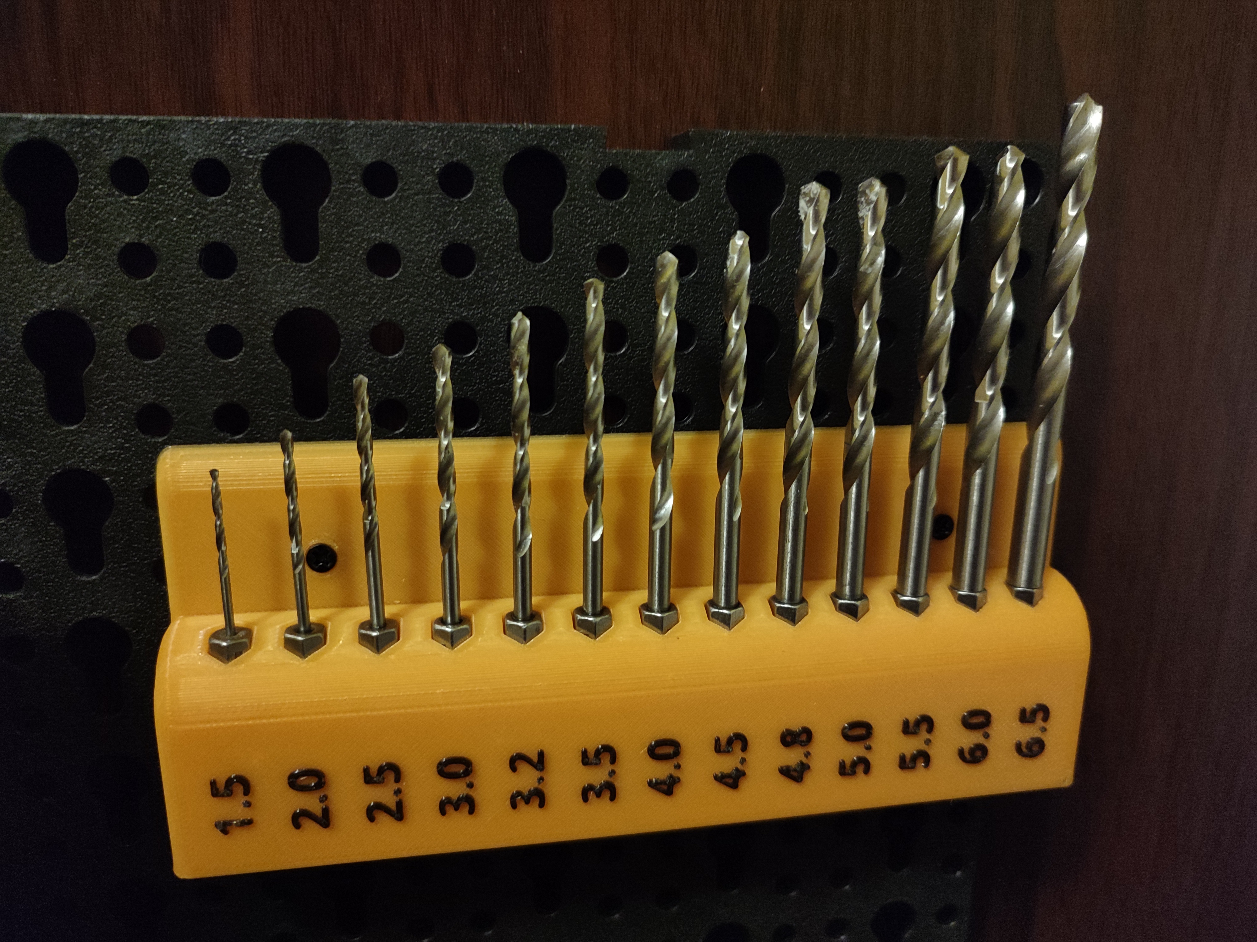 Holder for cordless drill and bit drills