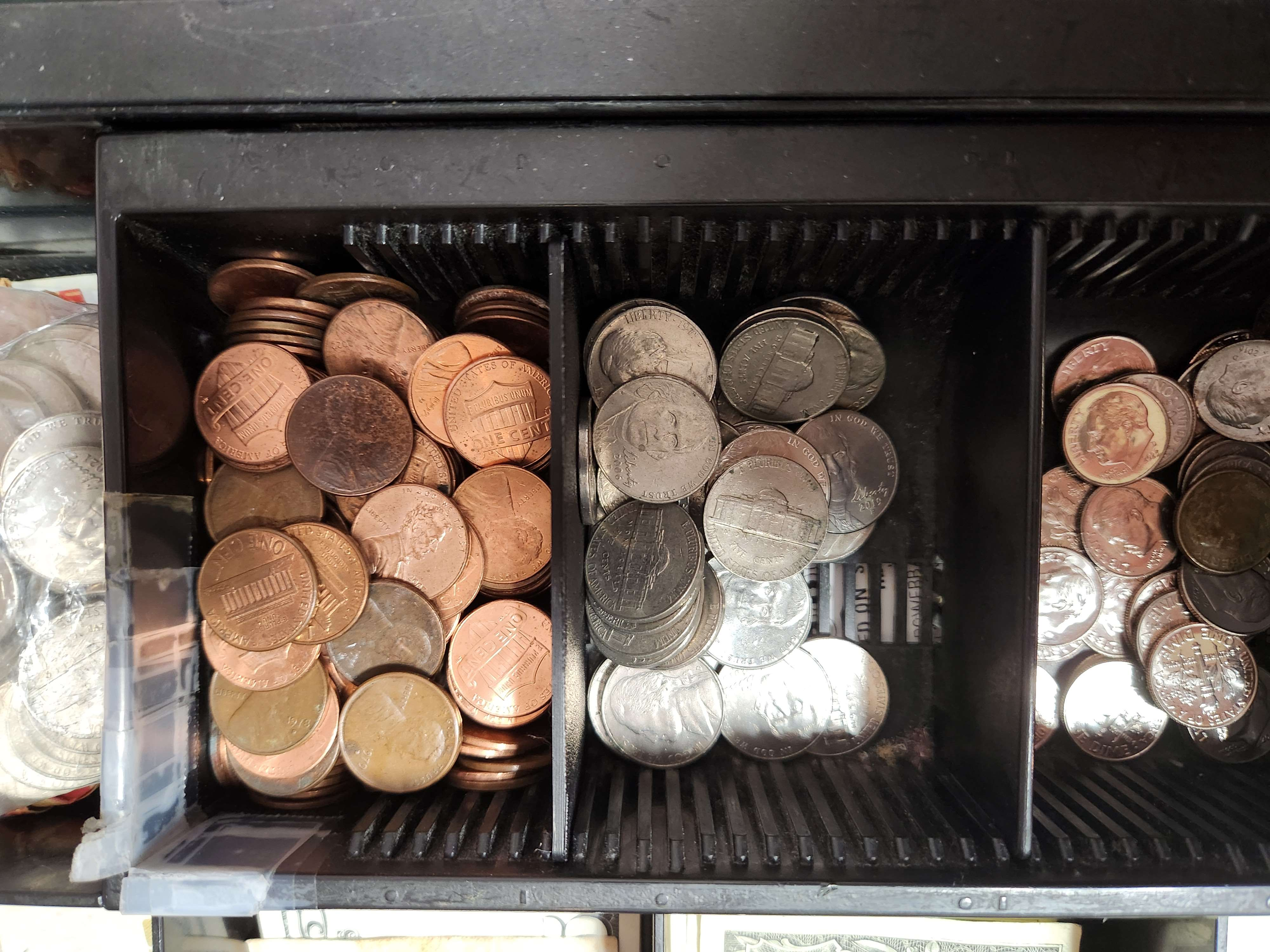 Coin divider for cash register