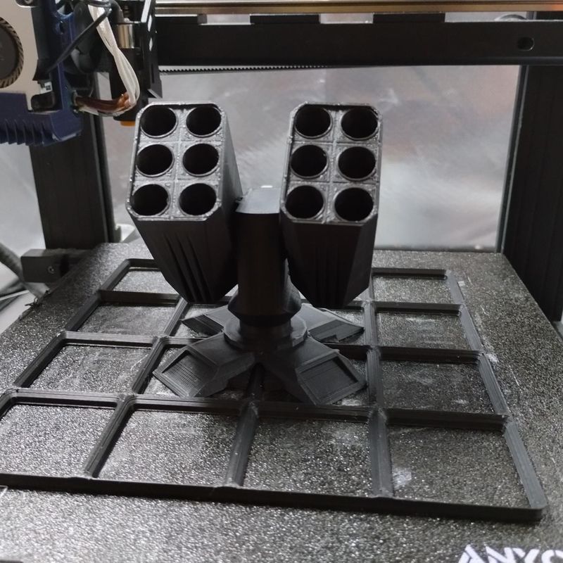 Gridfinity-compatible missile turret 3D print, iPhone stand and pen organizer integrated design