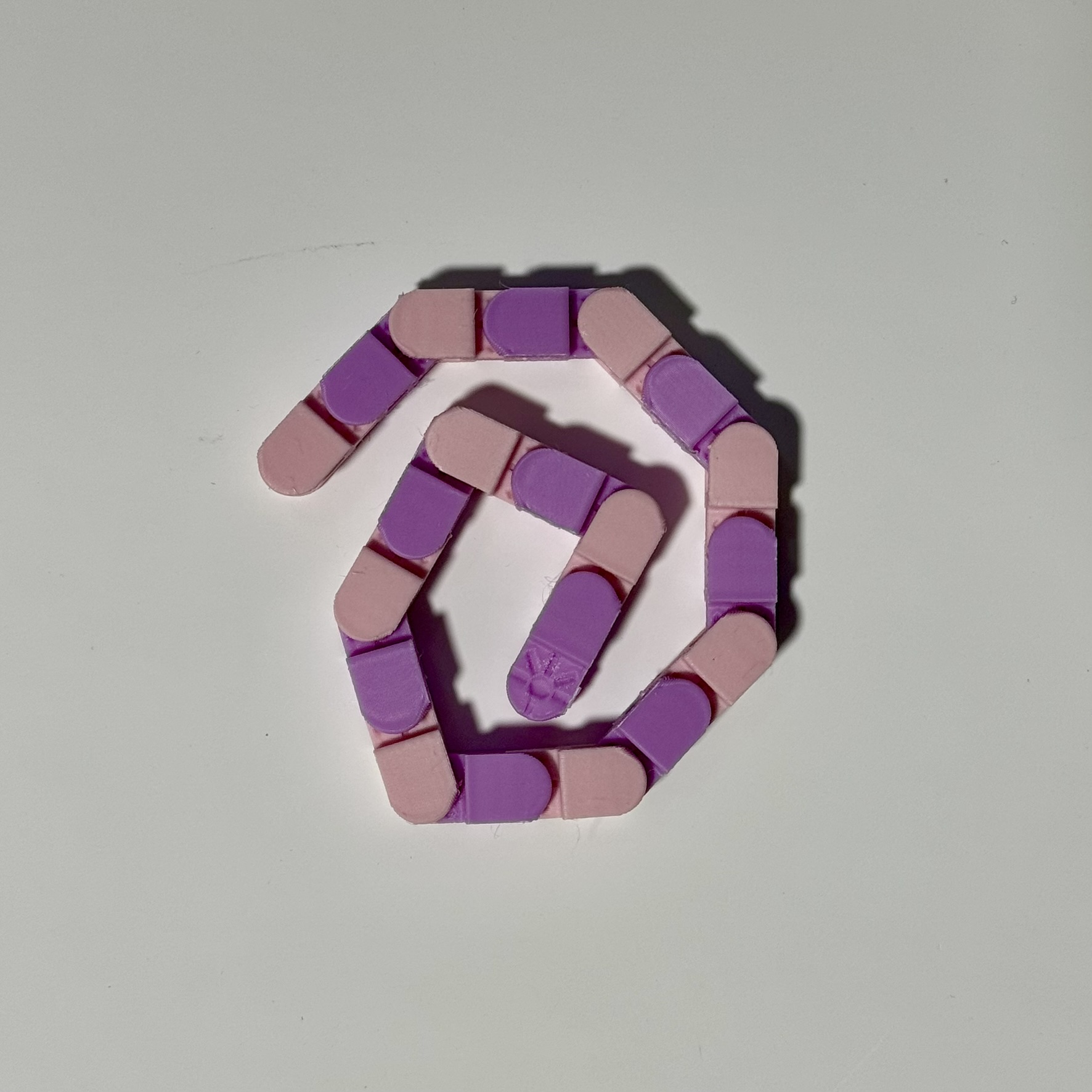 Decompression chain pieces, fidget chain links