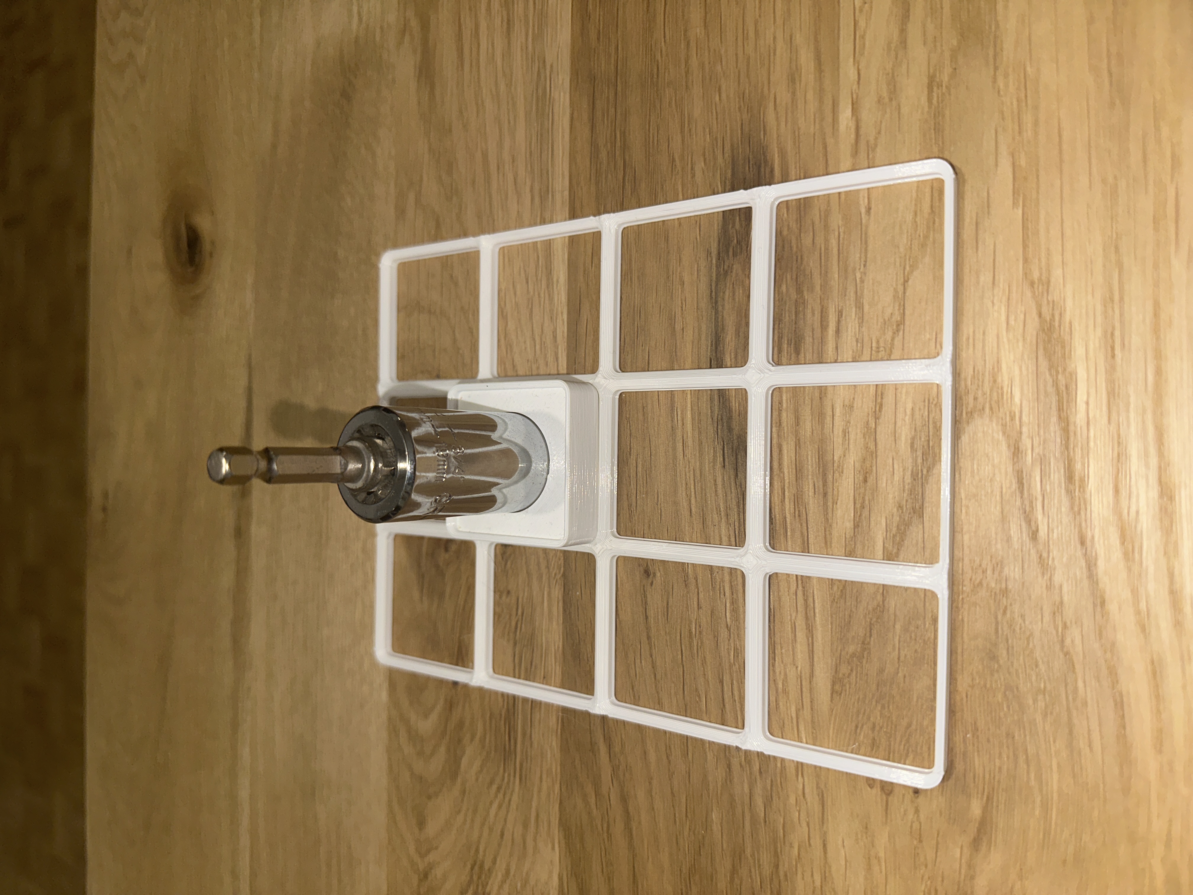 Gridfinity universal socket adapter holder