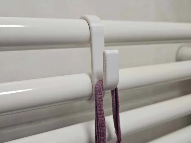 Towel hook for bathroom radiator