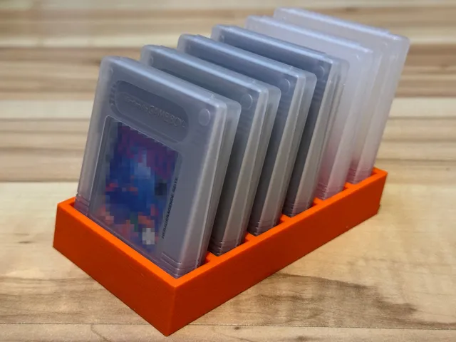 Stand for Game Boy(R) cartridges with cases