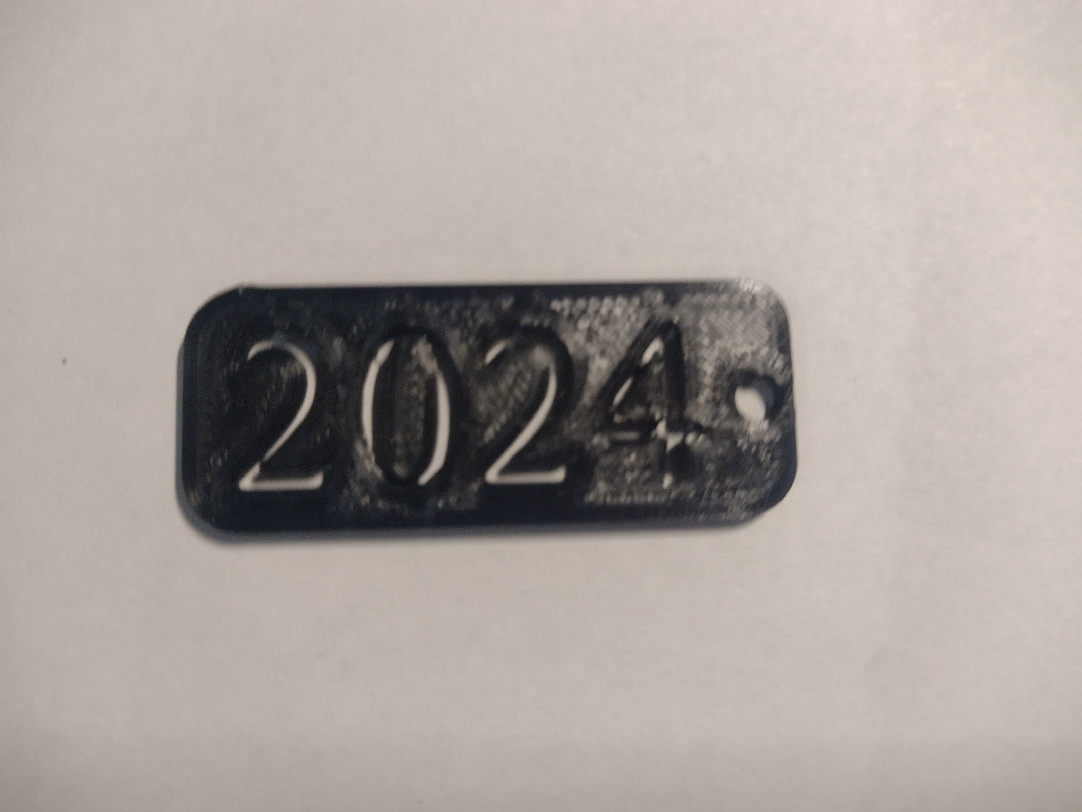 2024 Keyring par Capspam3D Téléchargez gratuitement un modèle STL