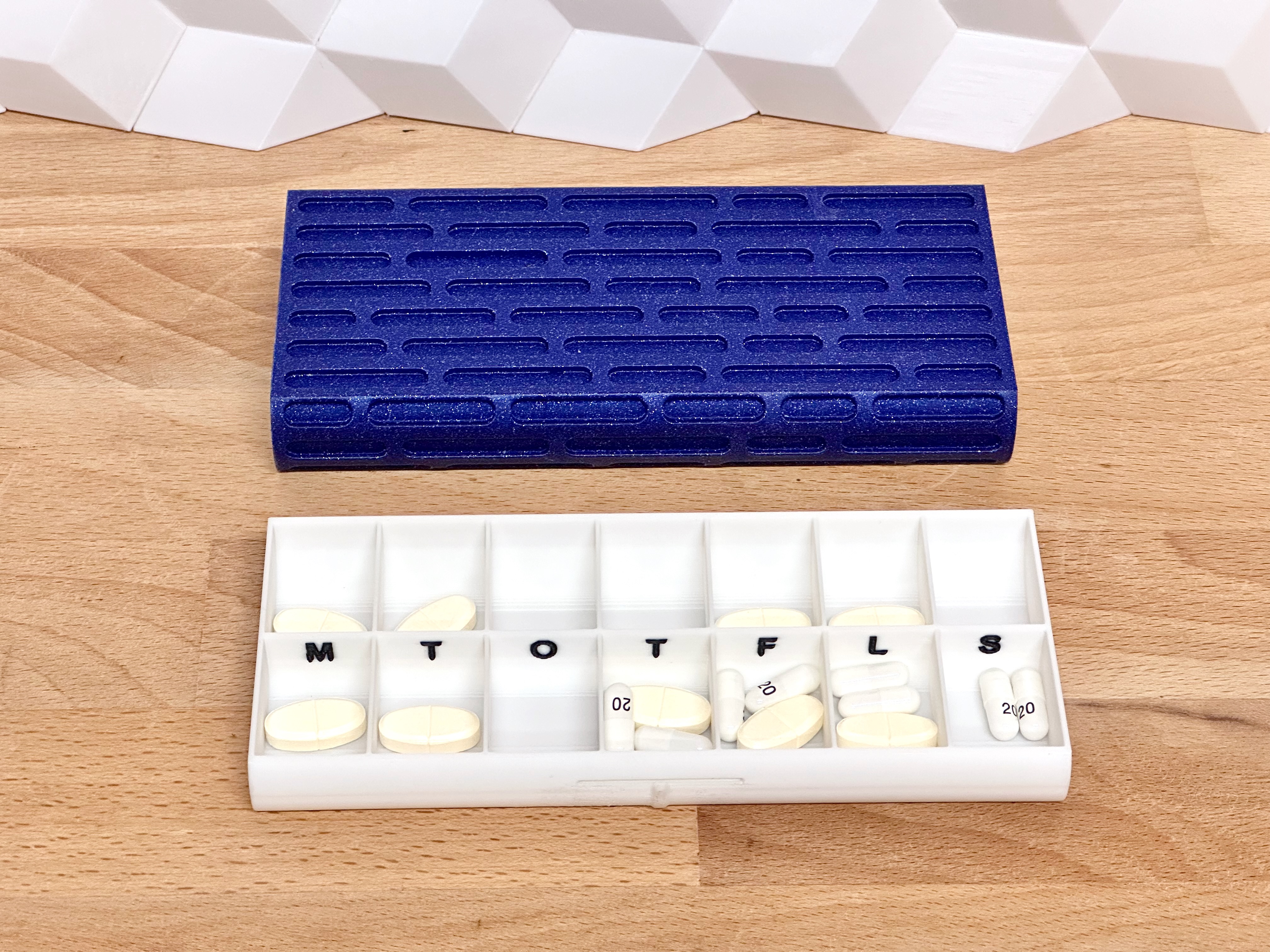 Sliding pill box textured organizer for weekly medication by