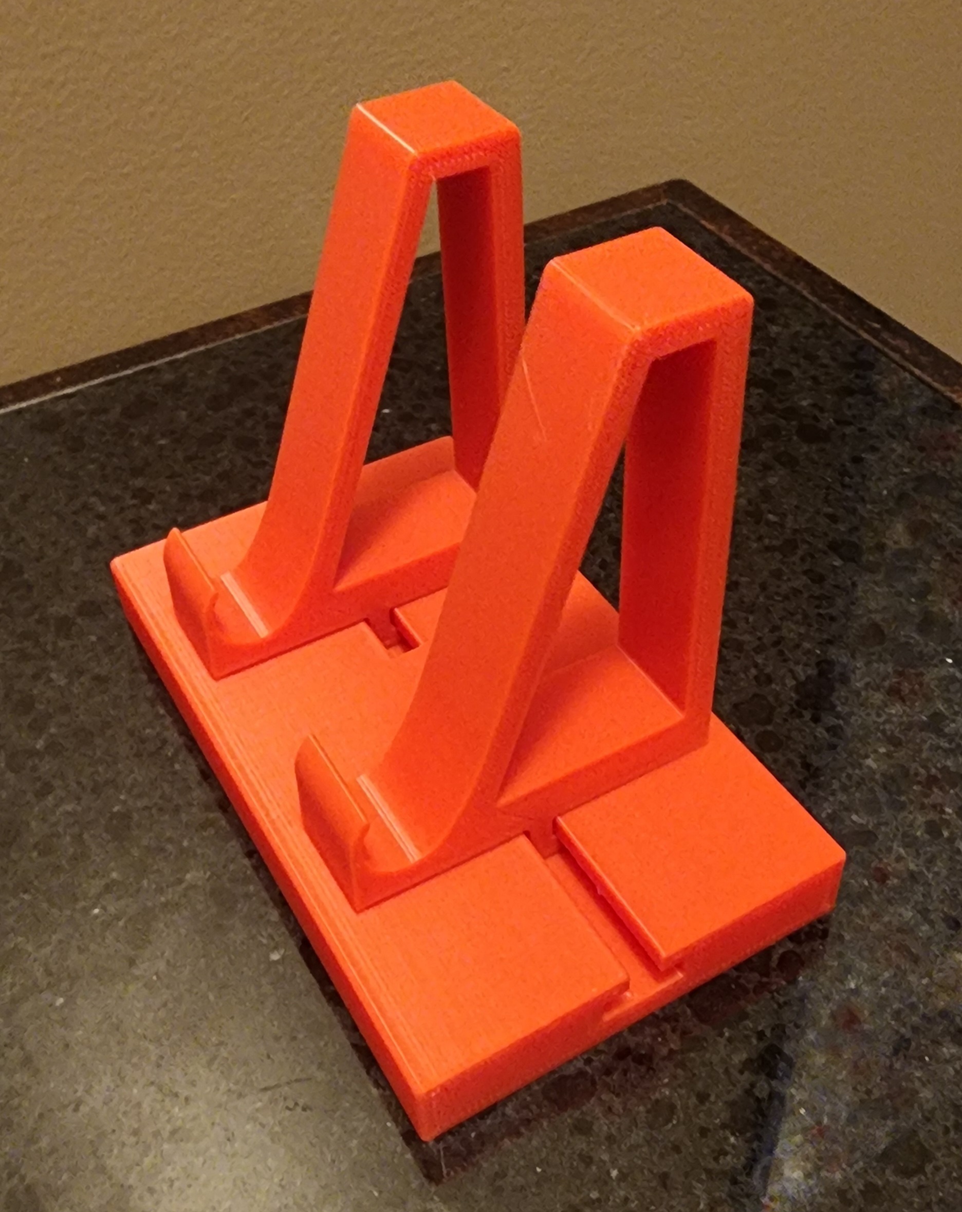 Adjustable cell phone stand