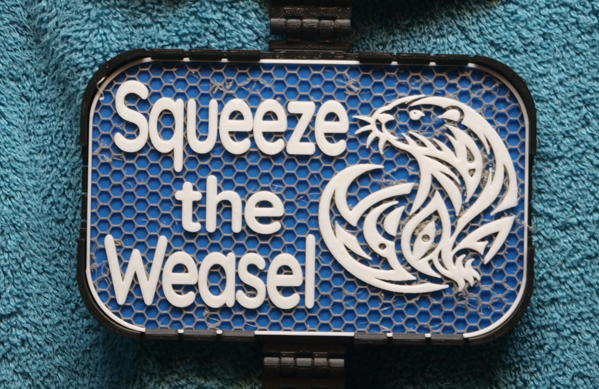 Squeeze the Weasel sign