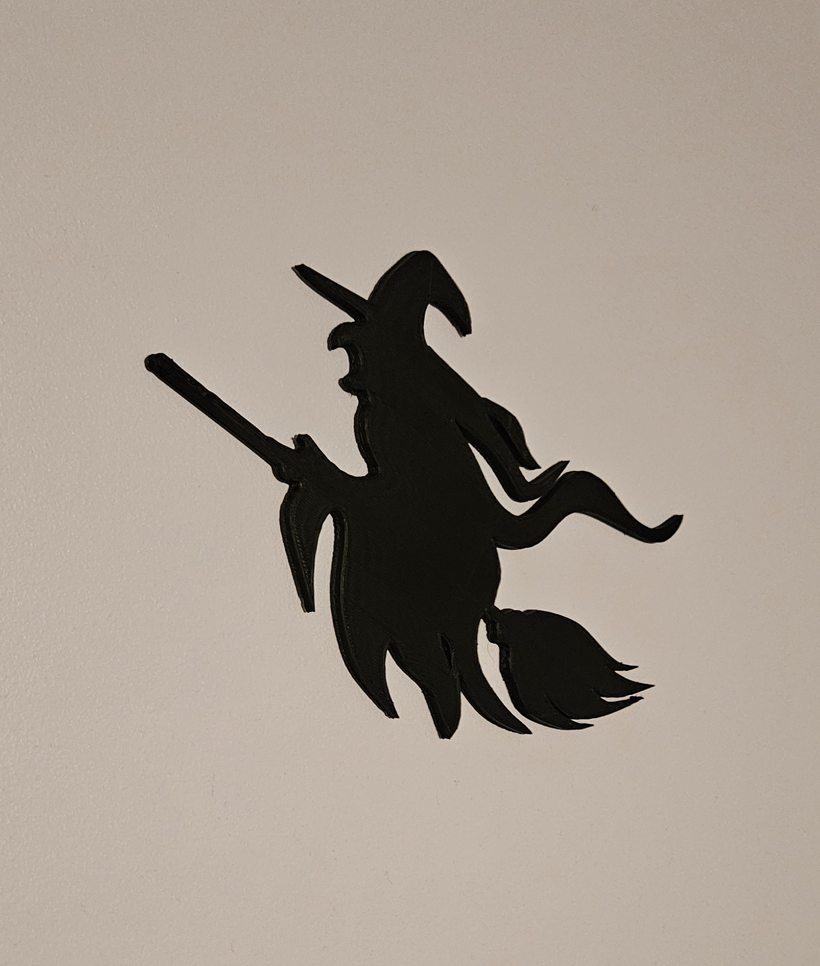 witch on a broom wall art