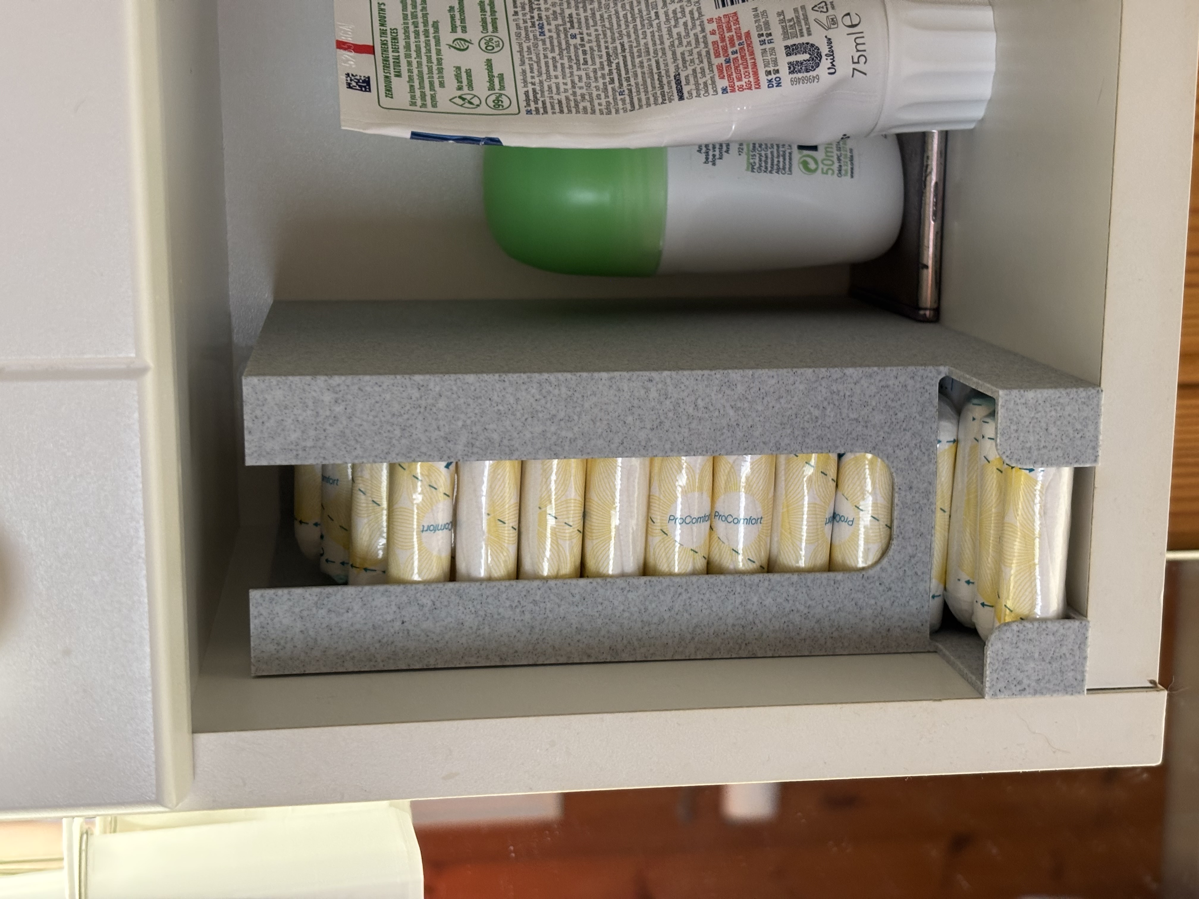 Dispenser for tampons (beveled front)