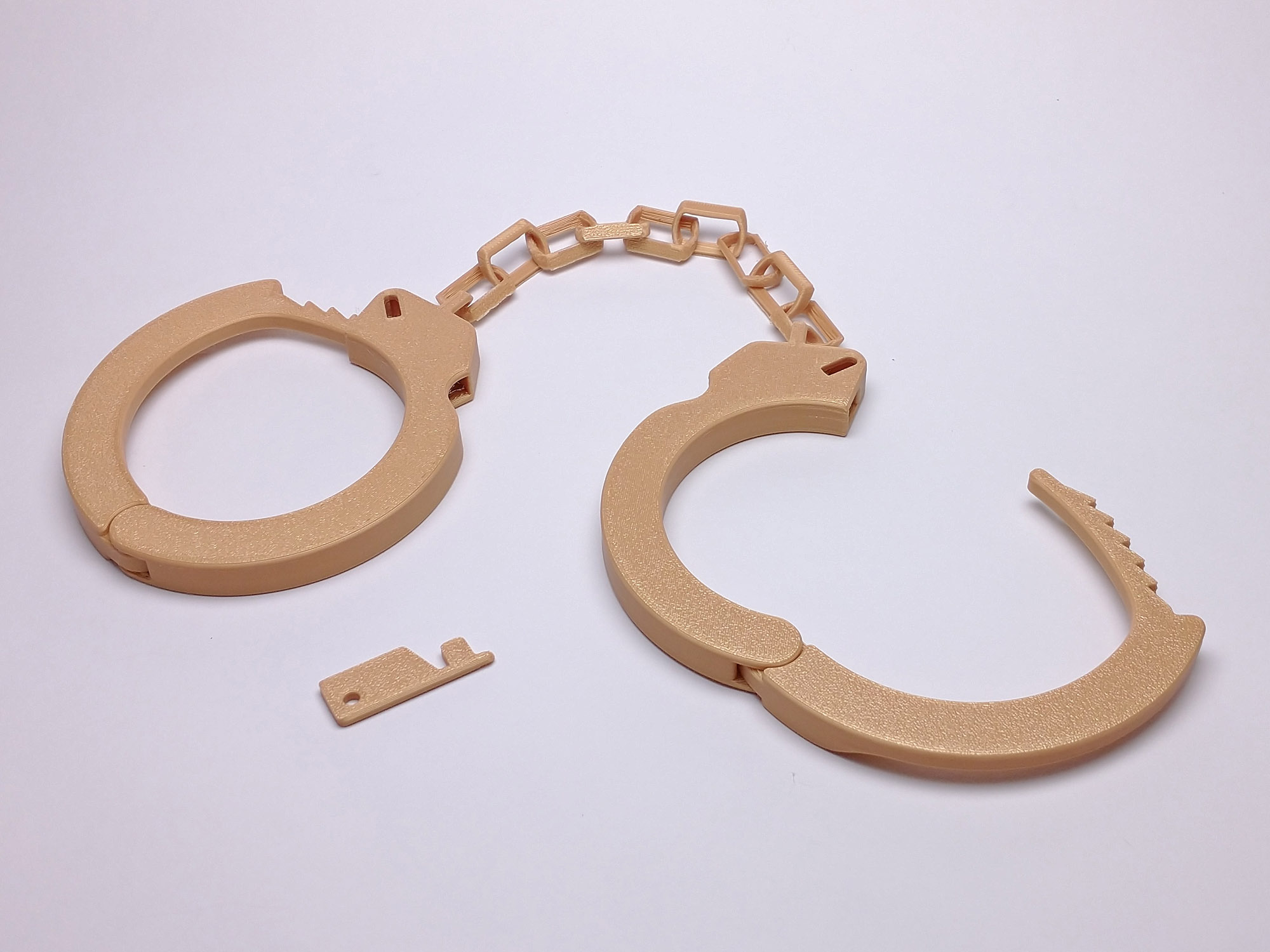 toy-handcuffs-with-key-print-in-place-by-lobocnc-download-free-stl