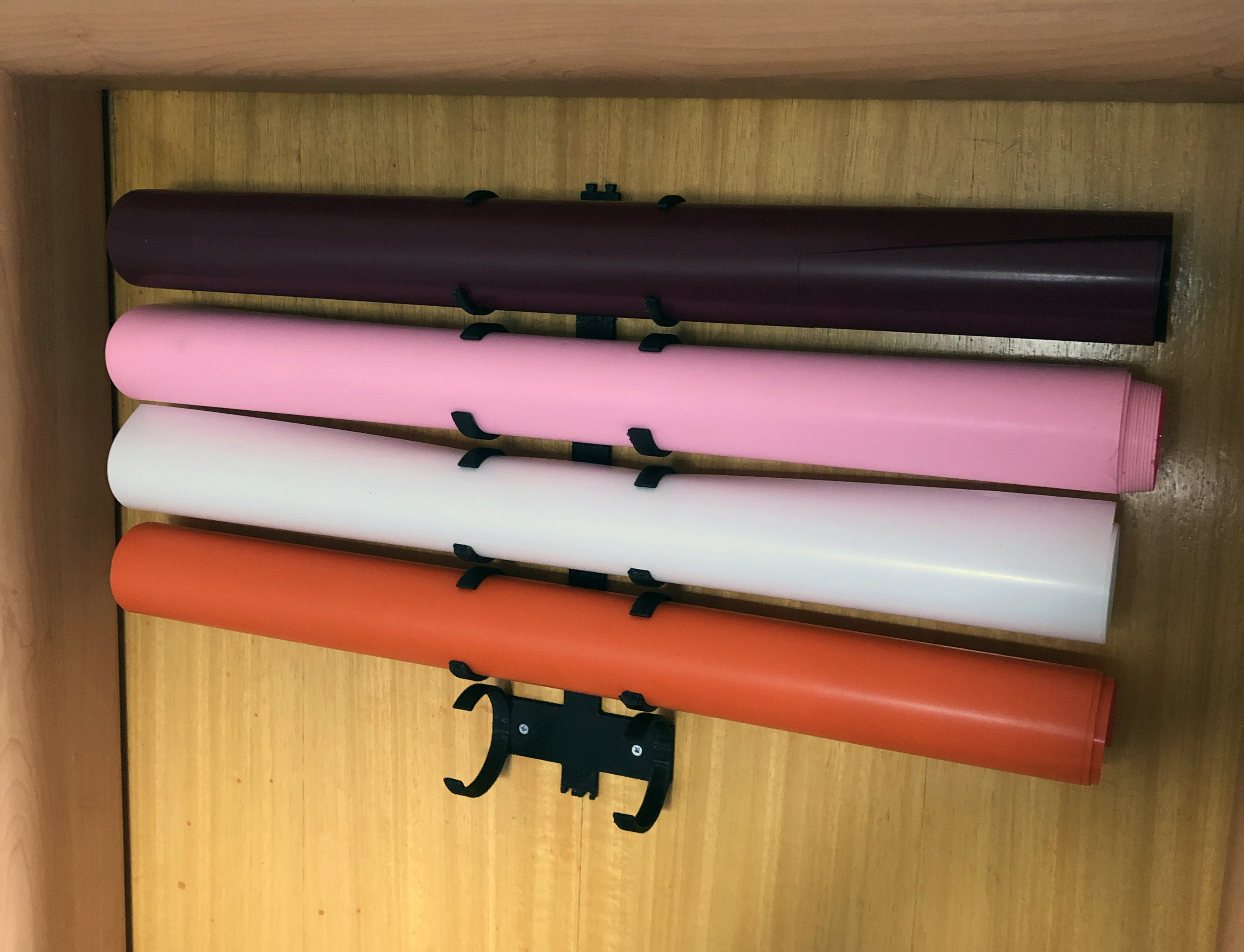 Wall rolls holder