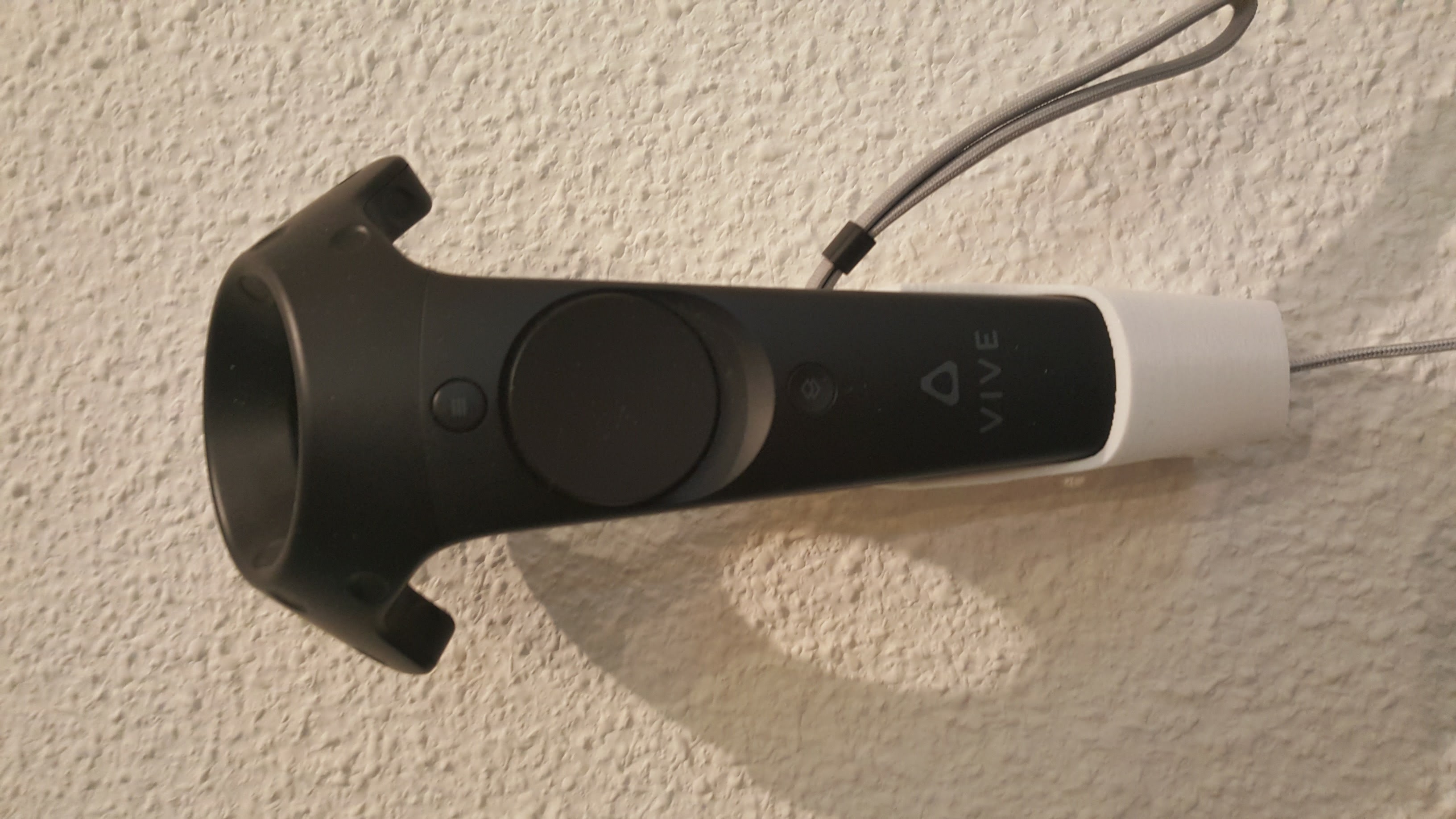 HTC Vive controller wall mount and charging station