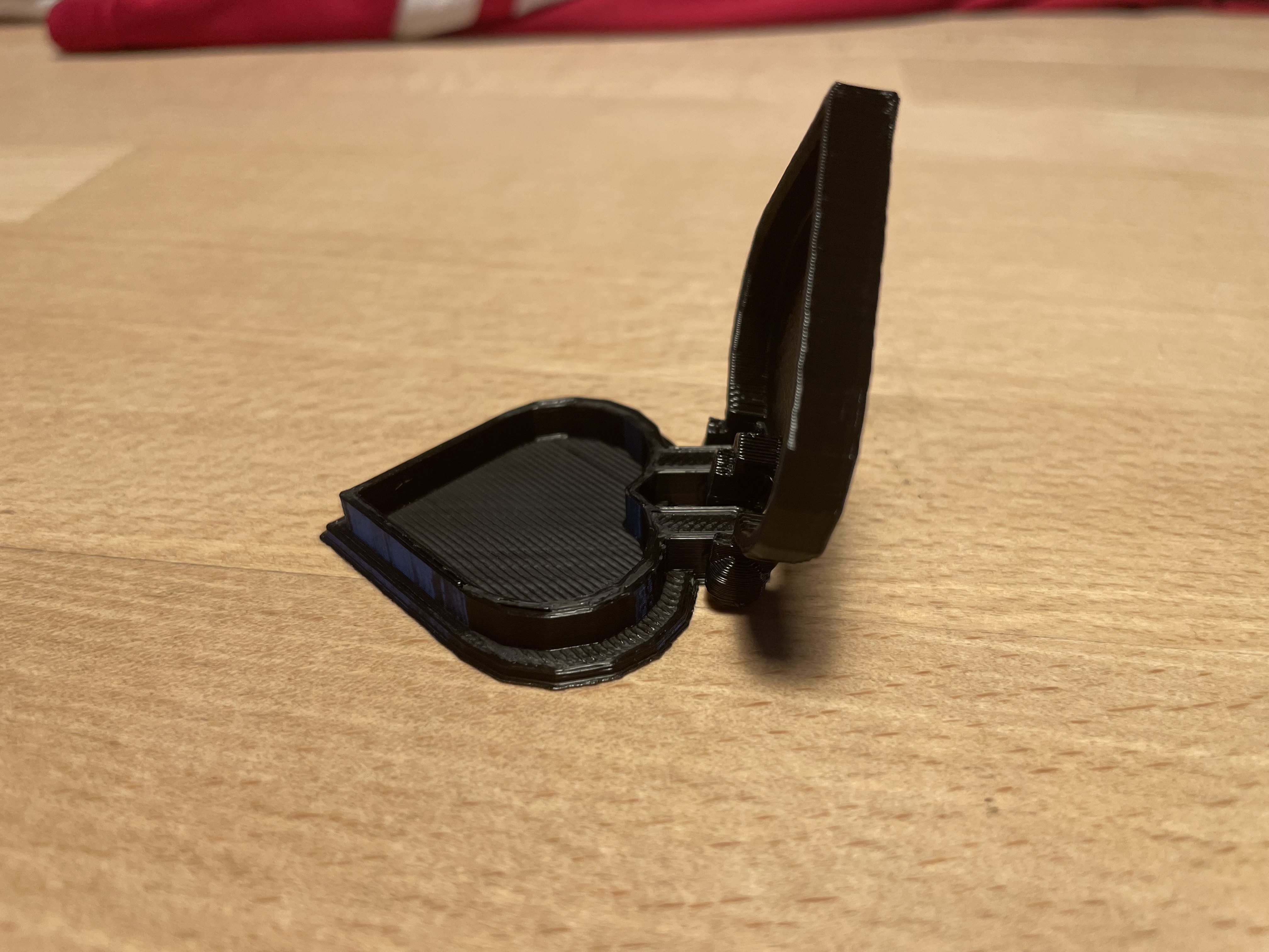 Hinged heart container