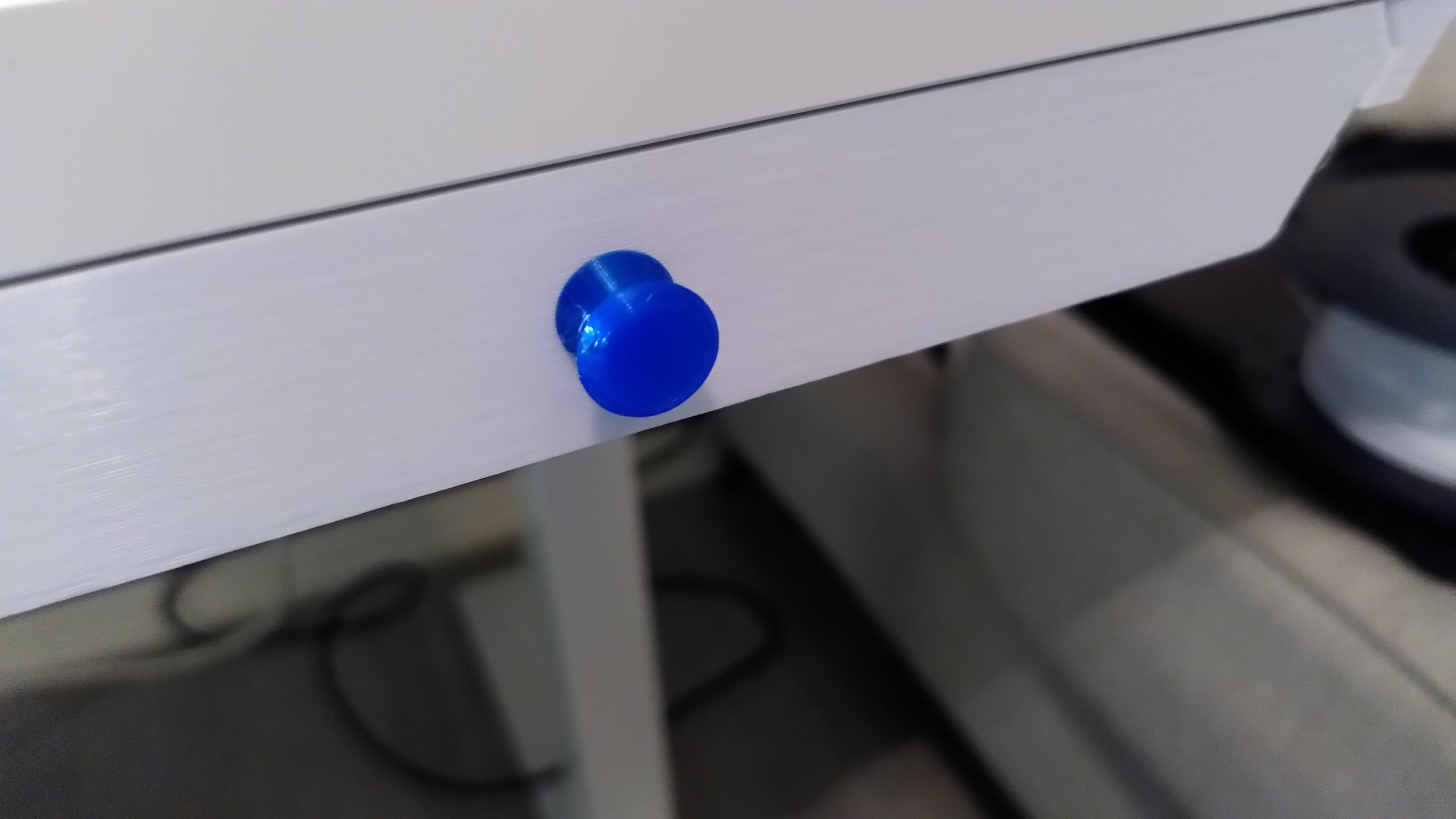 A simple knob for the under desk drawer