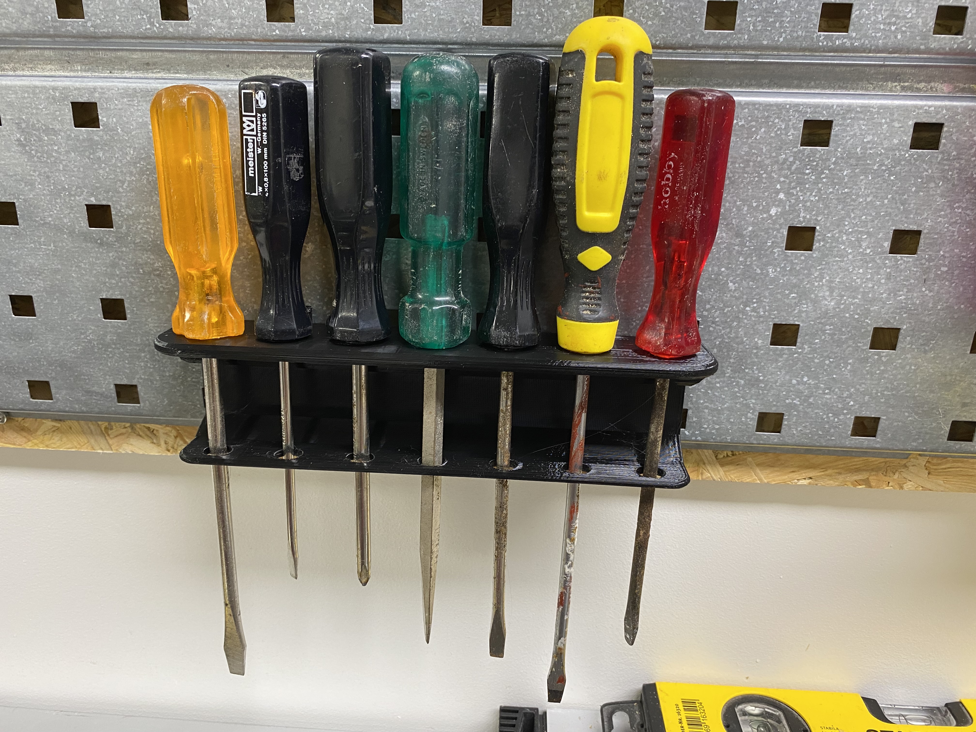 Screwdriver holder for Raaco tool wall panel