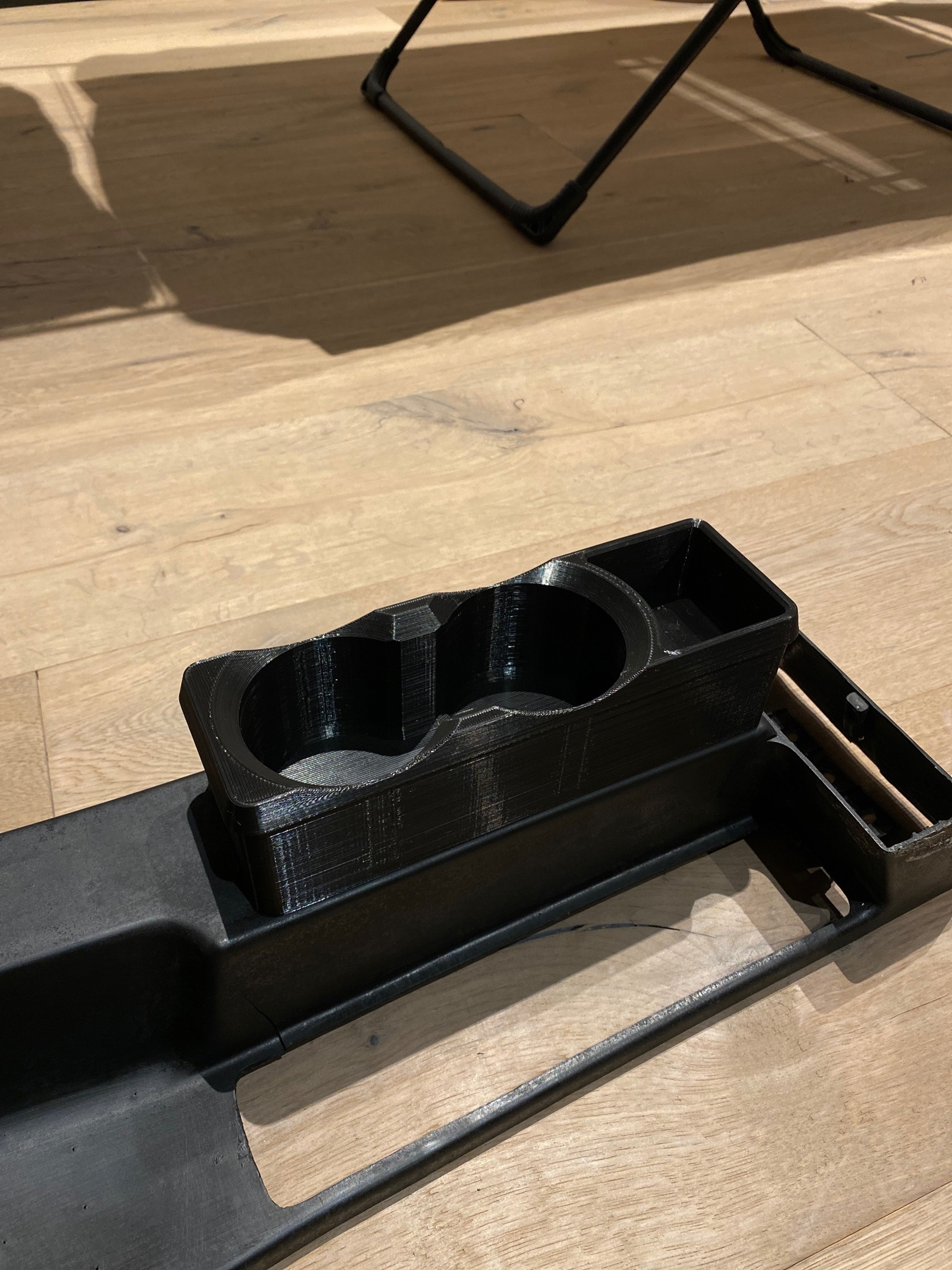 Cup holder for BMW E30.