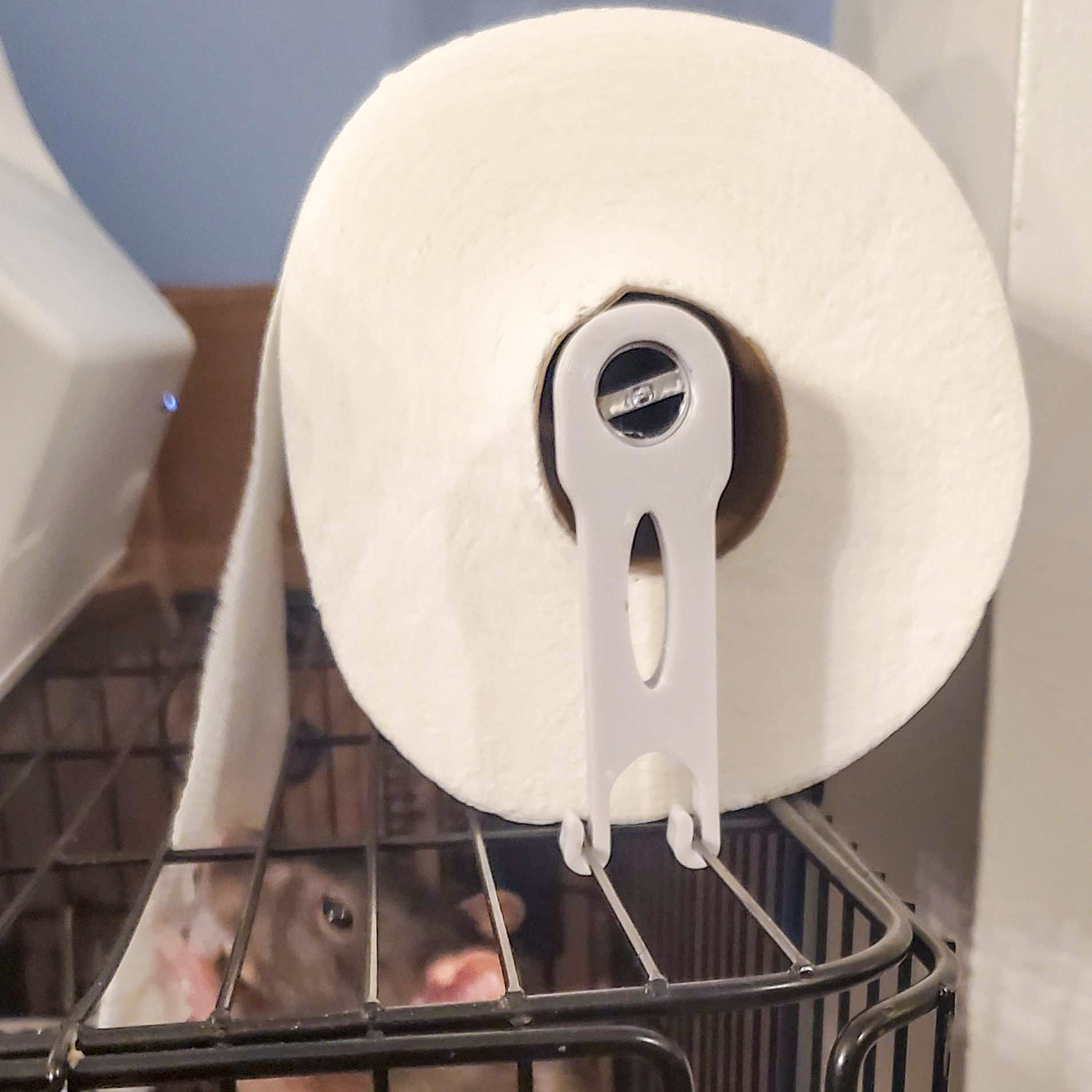 Toilet paper mount for rodent cage