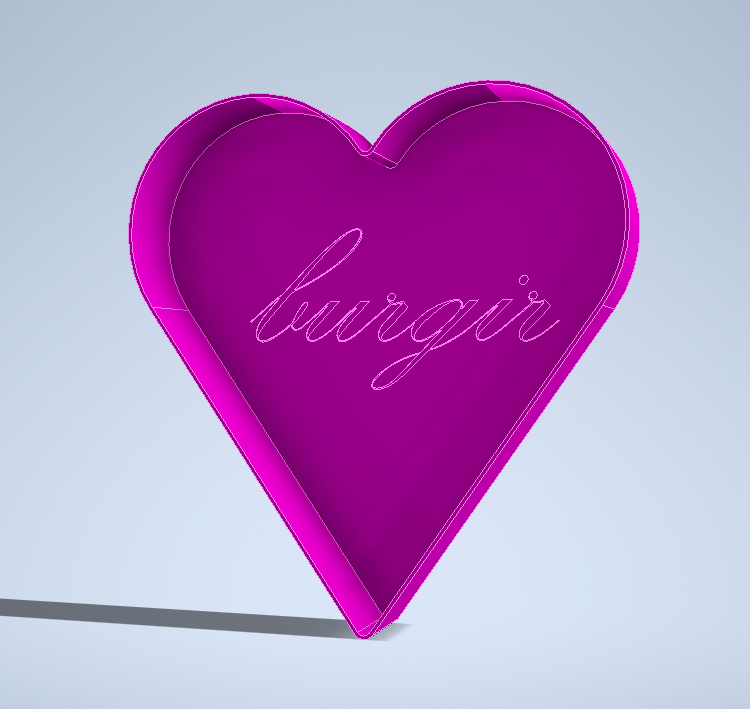 Heart shaped box with "burgir" written inside
