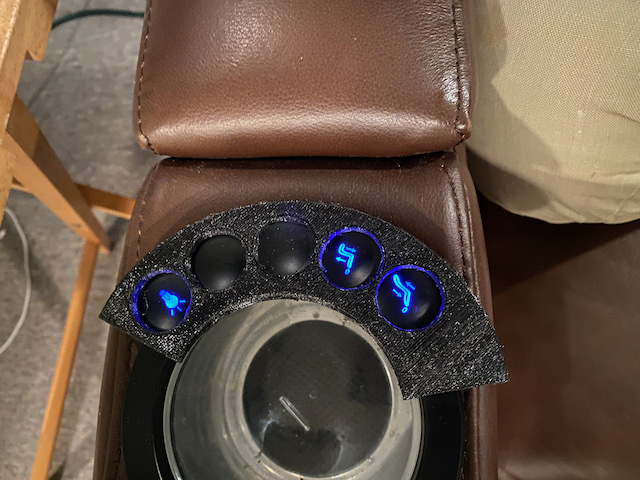 Blue button style Somerset Theater seating button protector