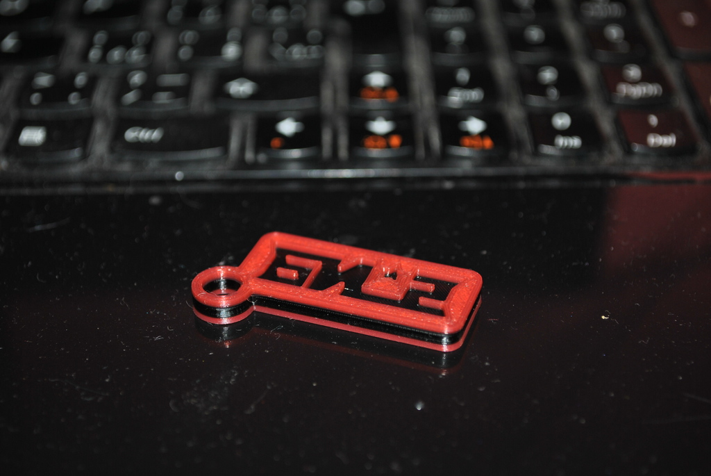 Keychain with "Би-2" logo