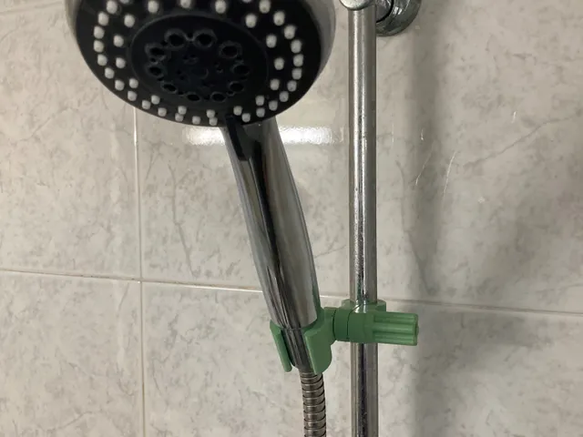 Shower head holder.