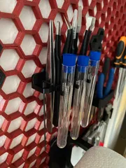 Custom holder for honeycomb storage wall system (HSW)