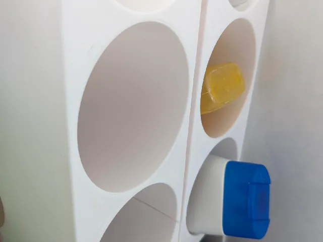 Shower gel bottle rack