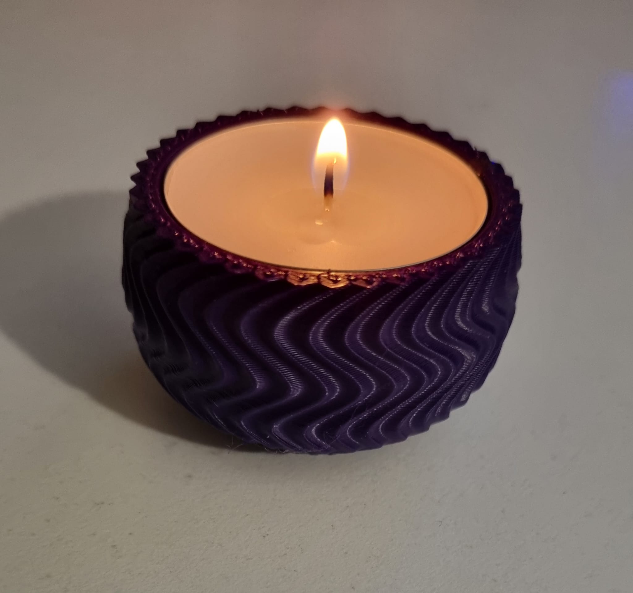 Tea candle wave holder