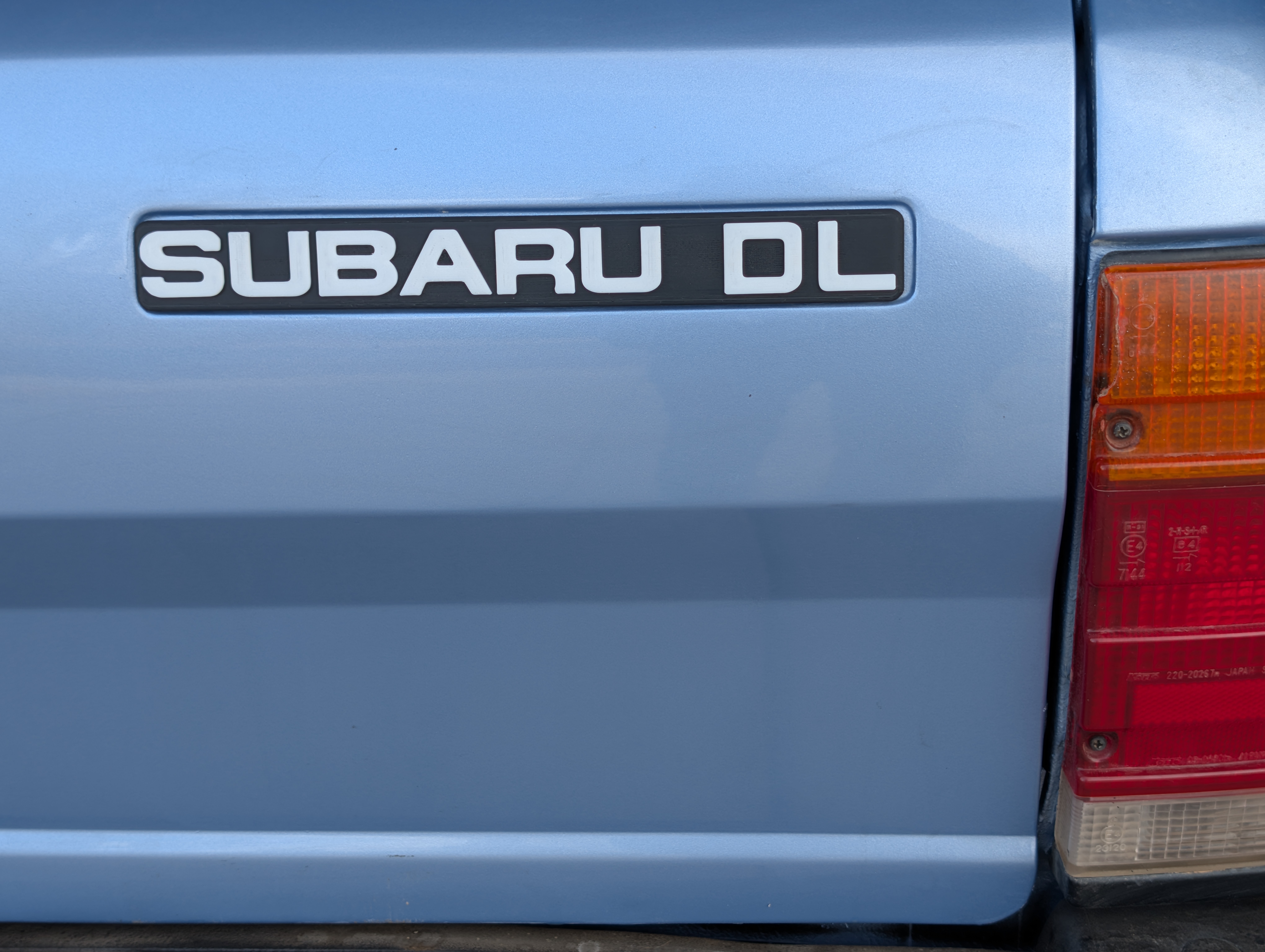 Subaru DL badge