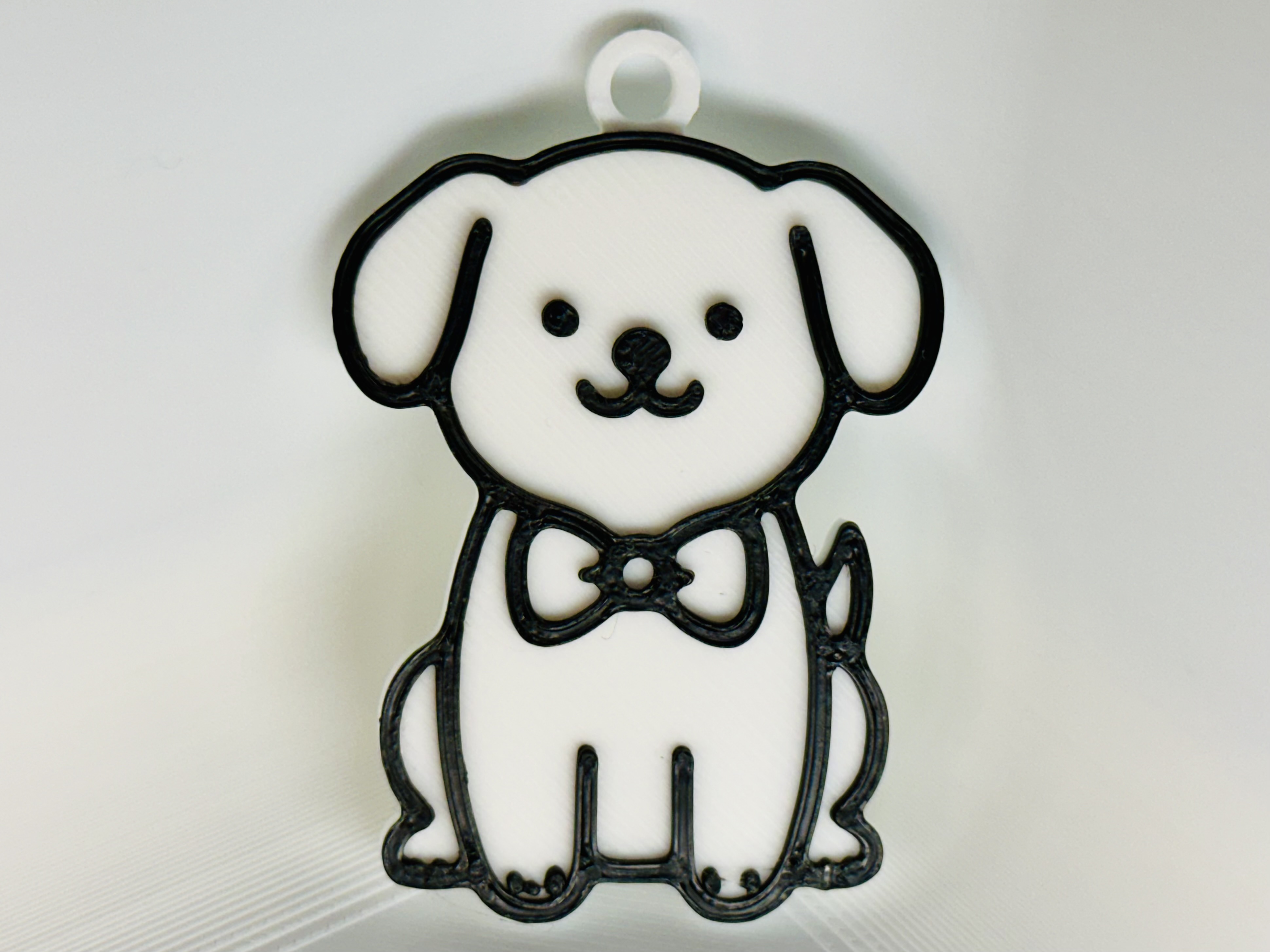 Dog Wearing a Bow Tie Keychain