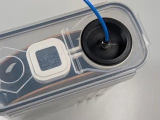 Drybox port with hygrometer holder