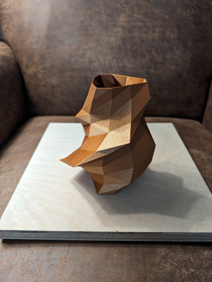Asymmetrical, low poly, twisted vase