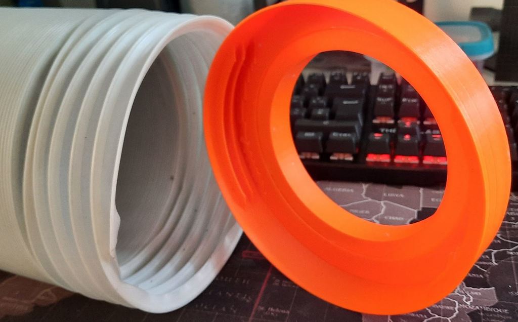 Flexible 150mm to 100mm PVC air conditioning adapter.