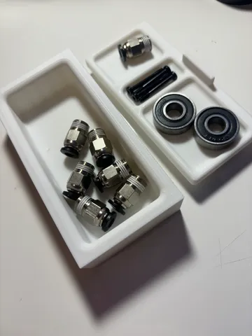 Box with parts tray cover