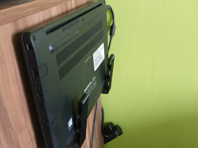 Wall mount hook for tablet or small laptop
