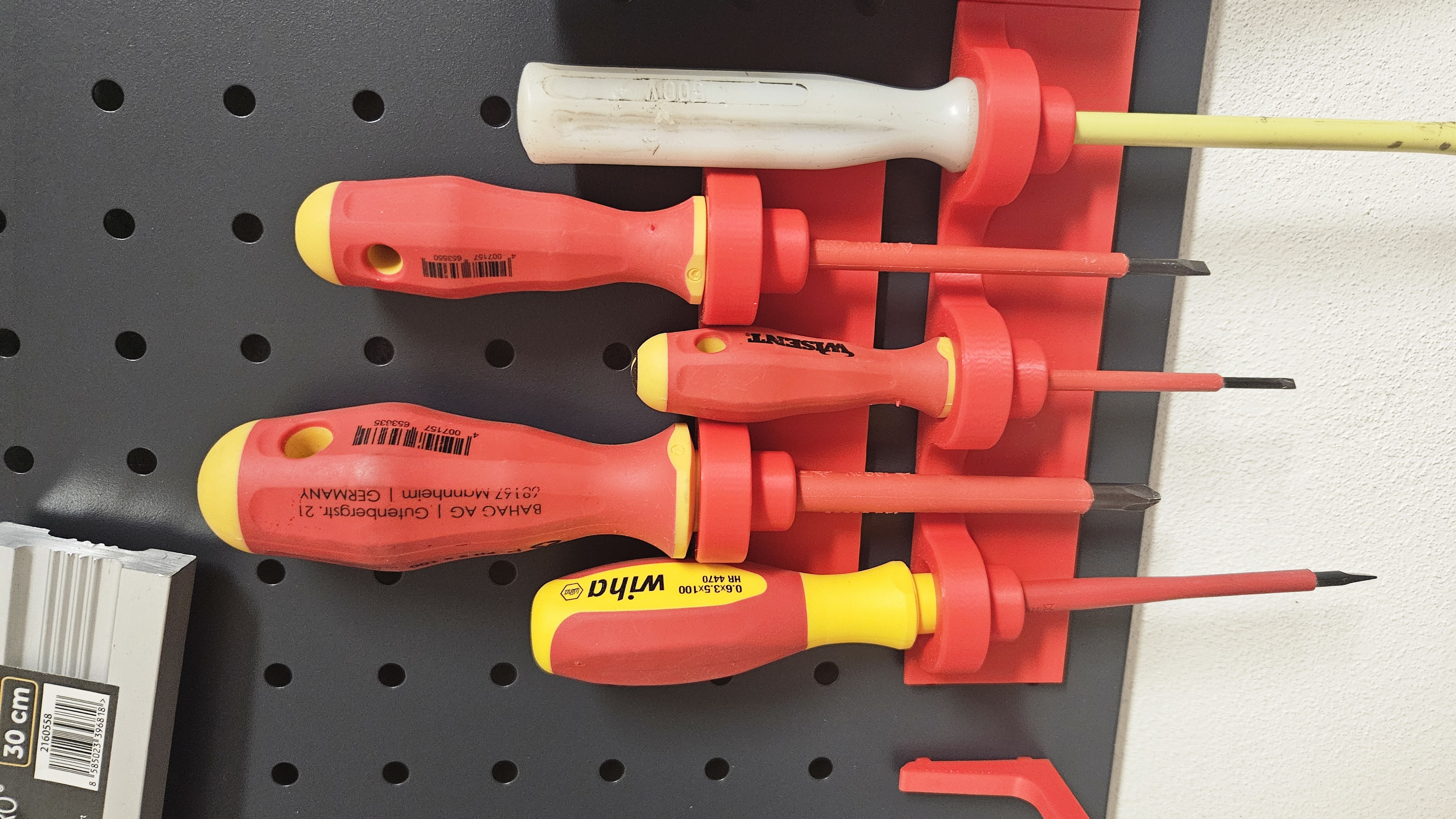 Pegboard screwdriver holder