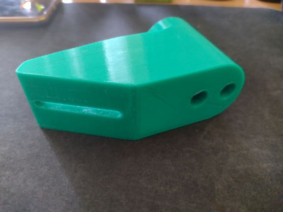 Angled holder for bidet hand shower