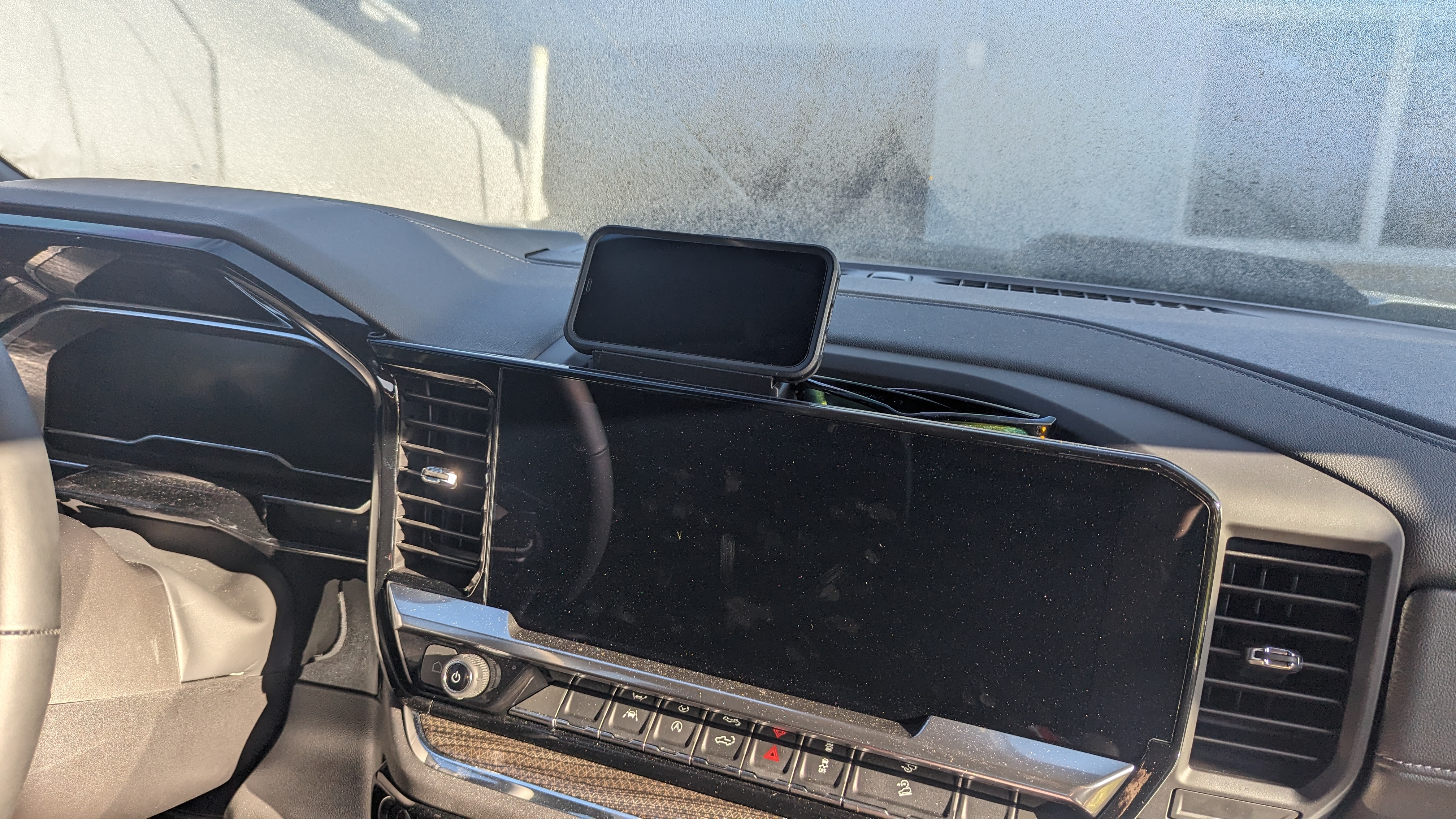 22+  GMC or Silverado Sunpass/Phone holder