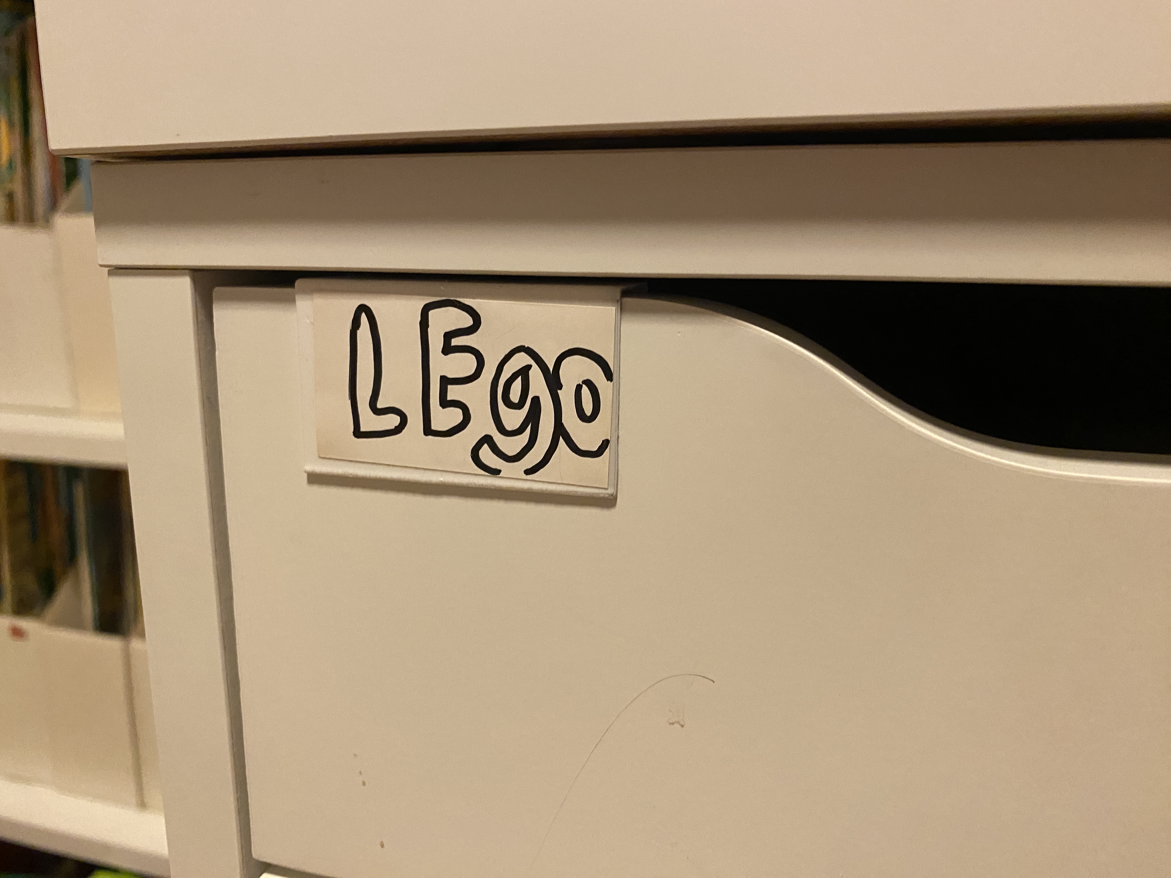 Snap on label for drawers and cabinet doors