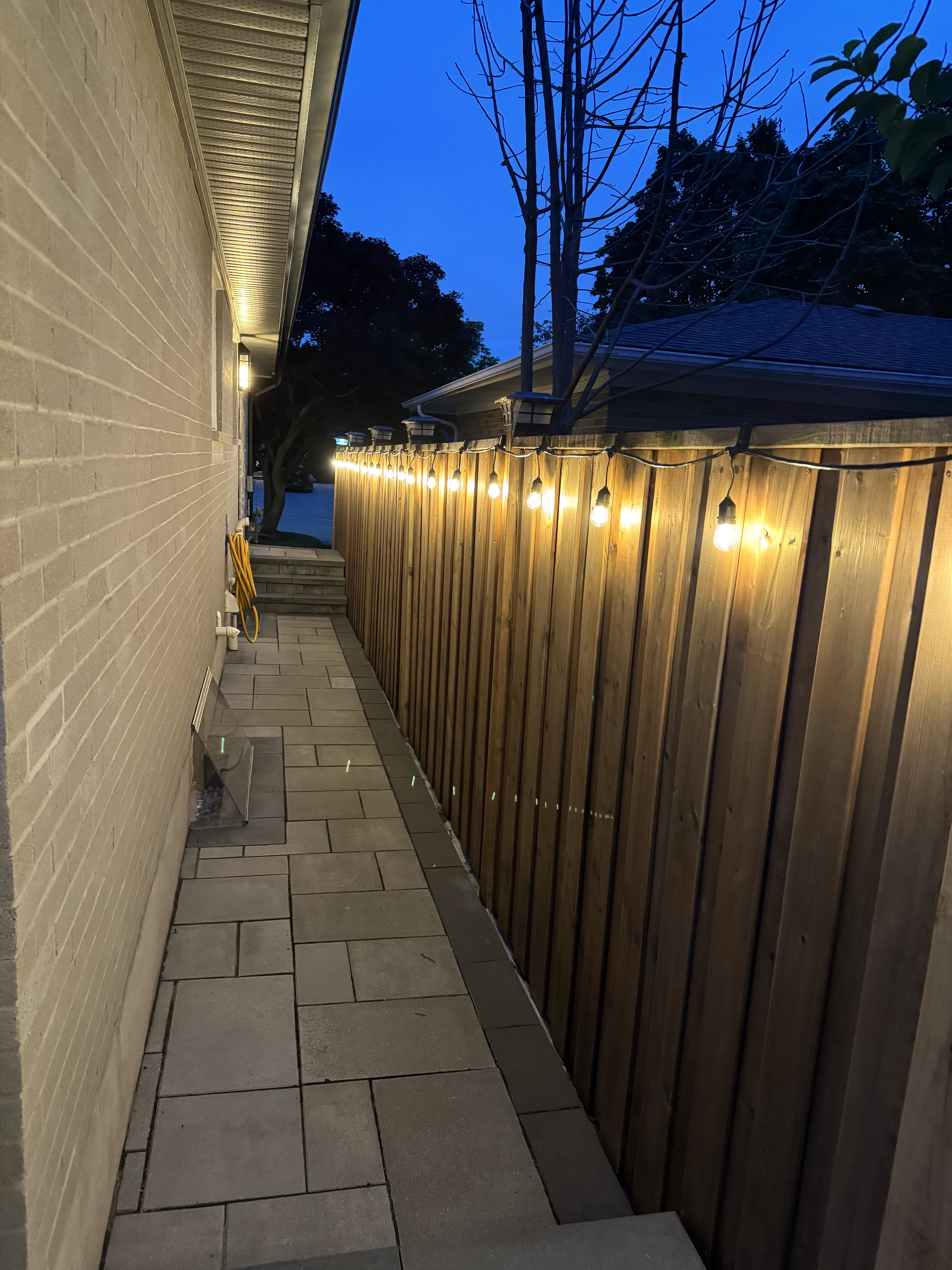 Exterior string lights fence hooks