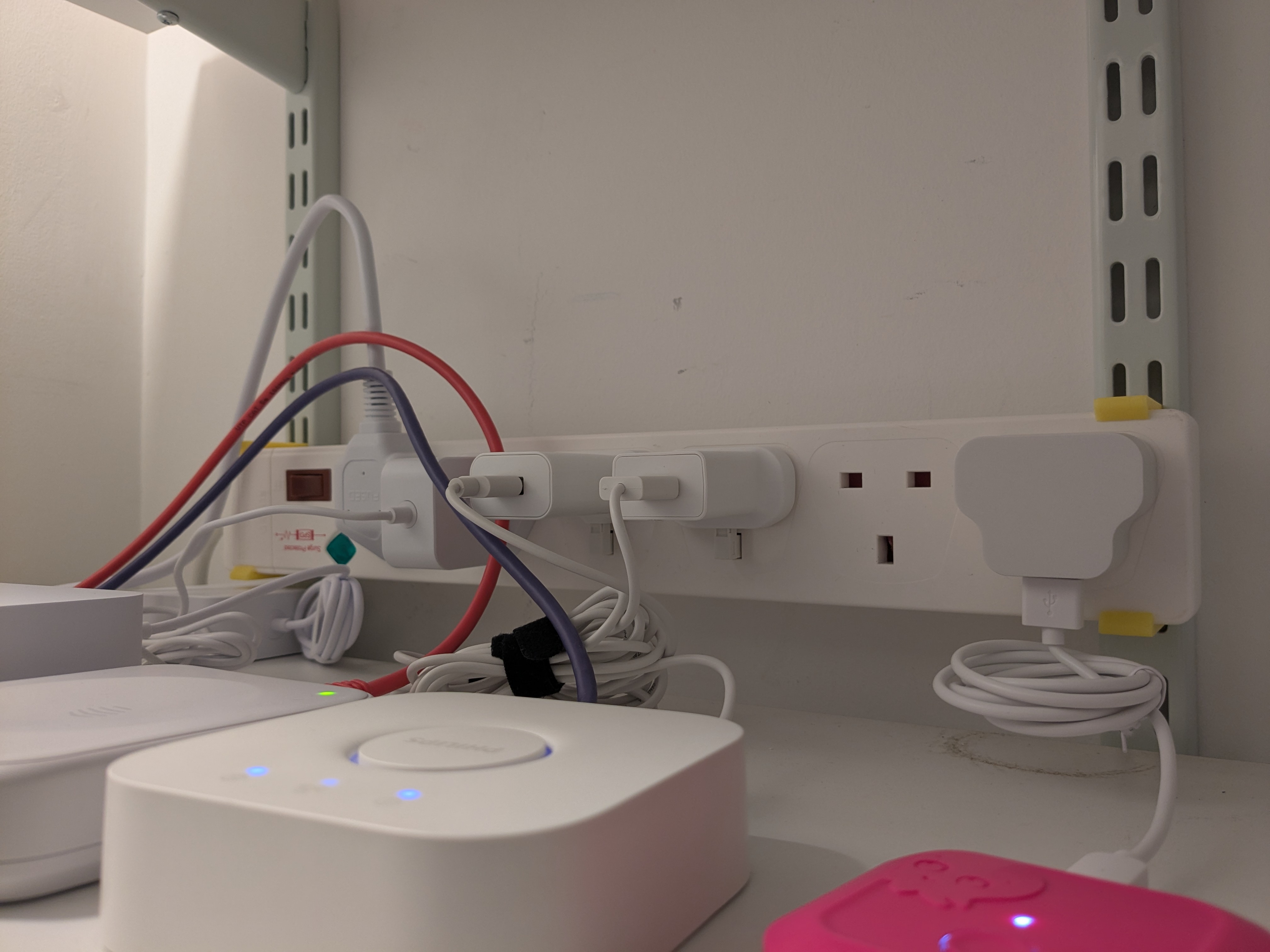 Power strip slotted shelving mount