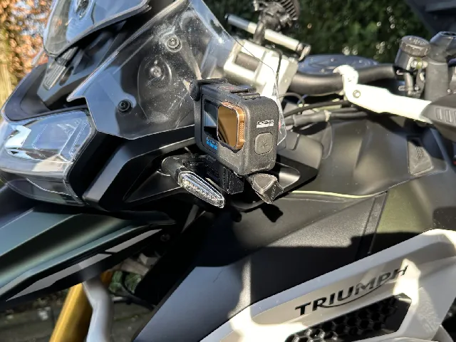 Gopromount on the indicator for motorcycle (Triumph Tiger)