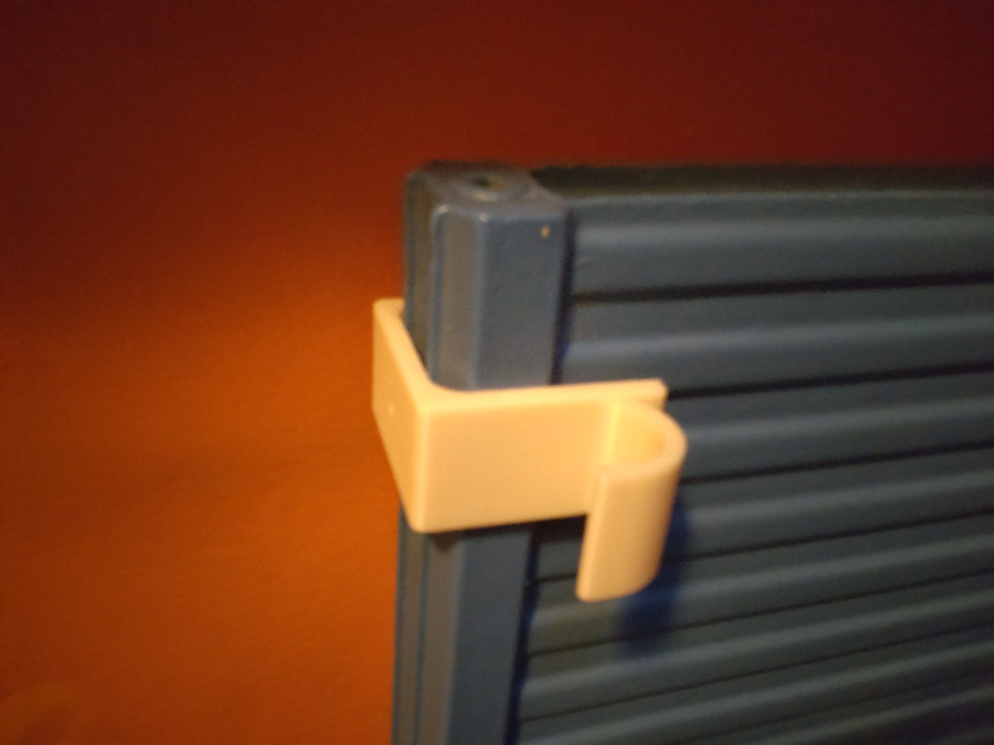 Hook for heating radiators with option for tall peg