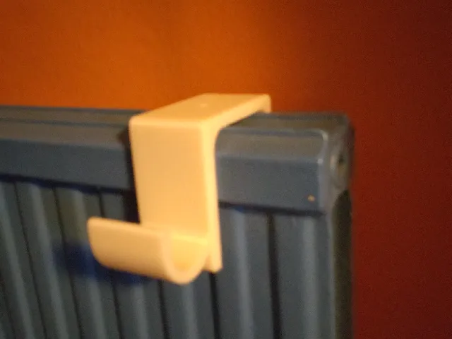 Hook for heating radiators with option for tall peg
