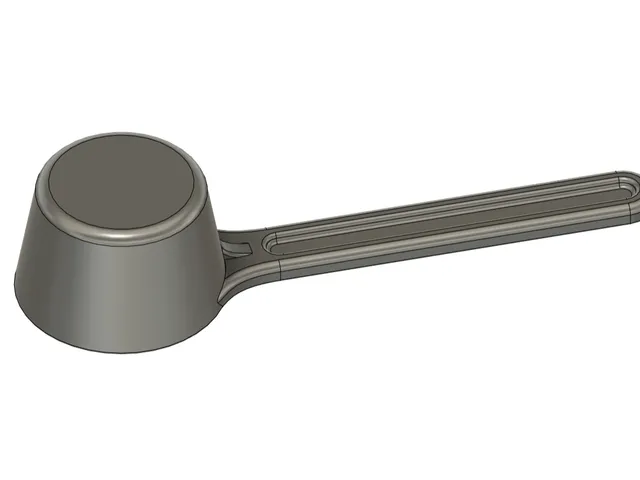 Spoon for a Delonghi coffee machine