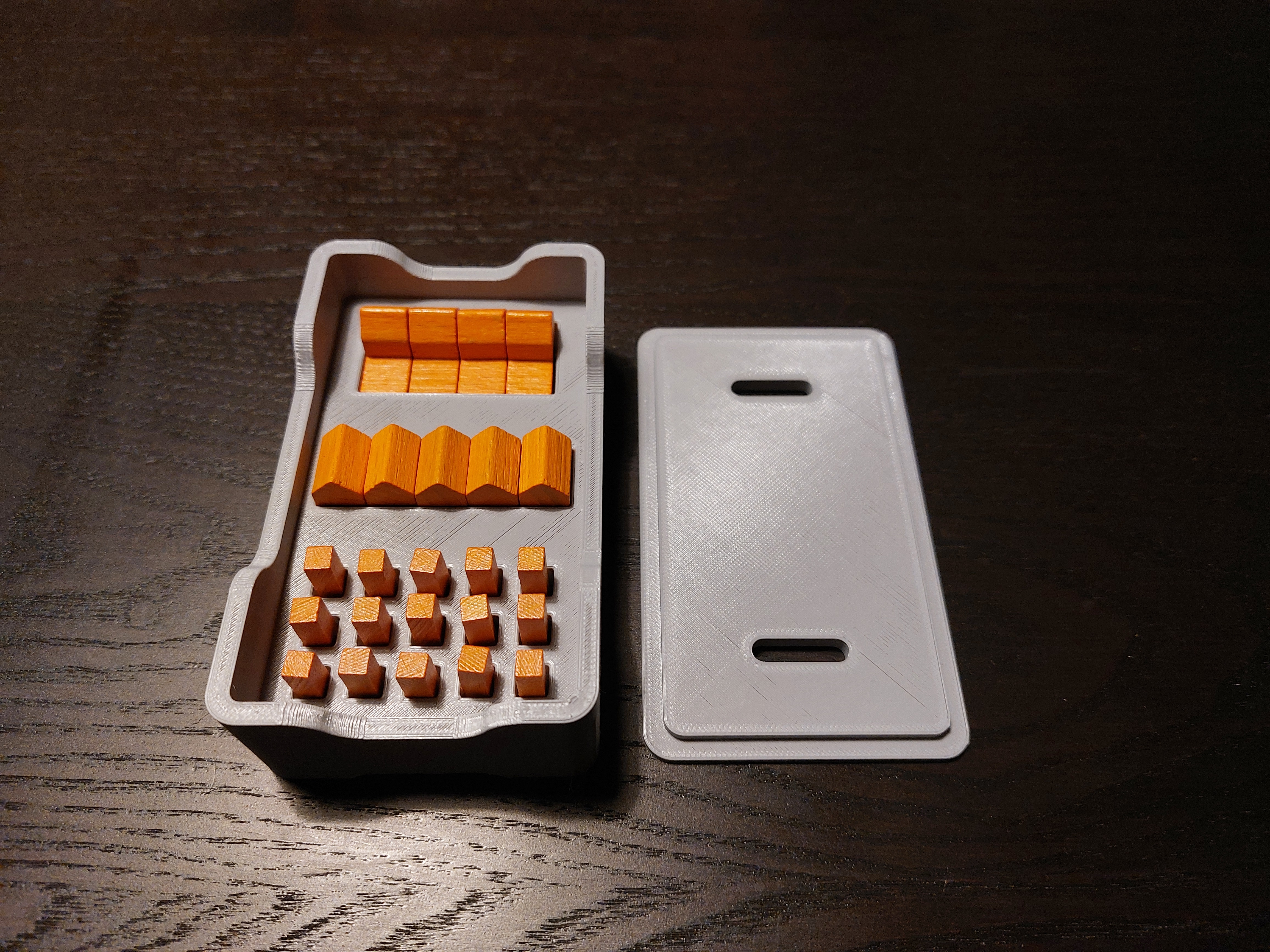 Catan Player pieces with lid for larger and smaller pieces